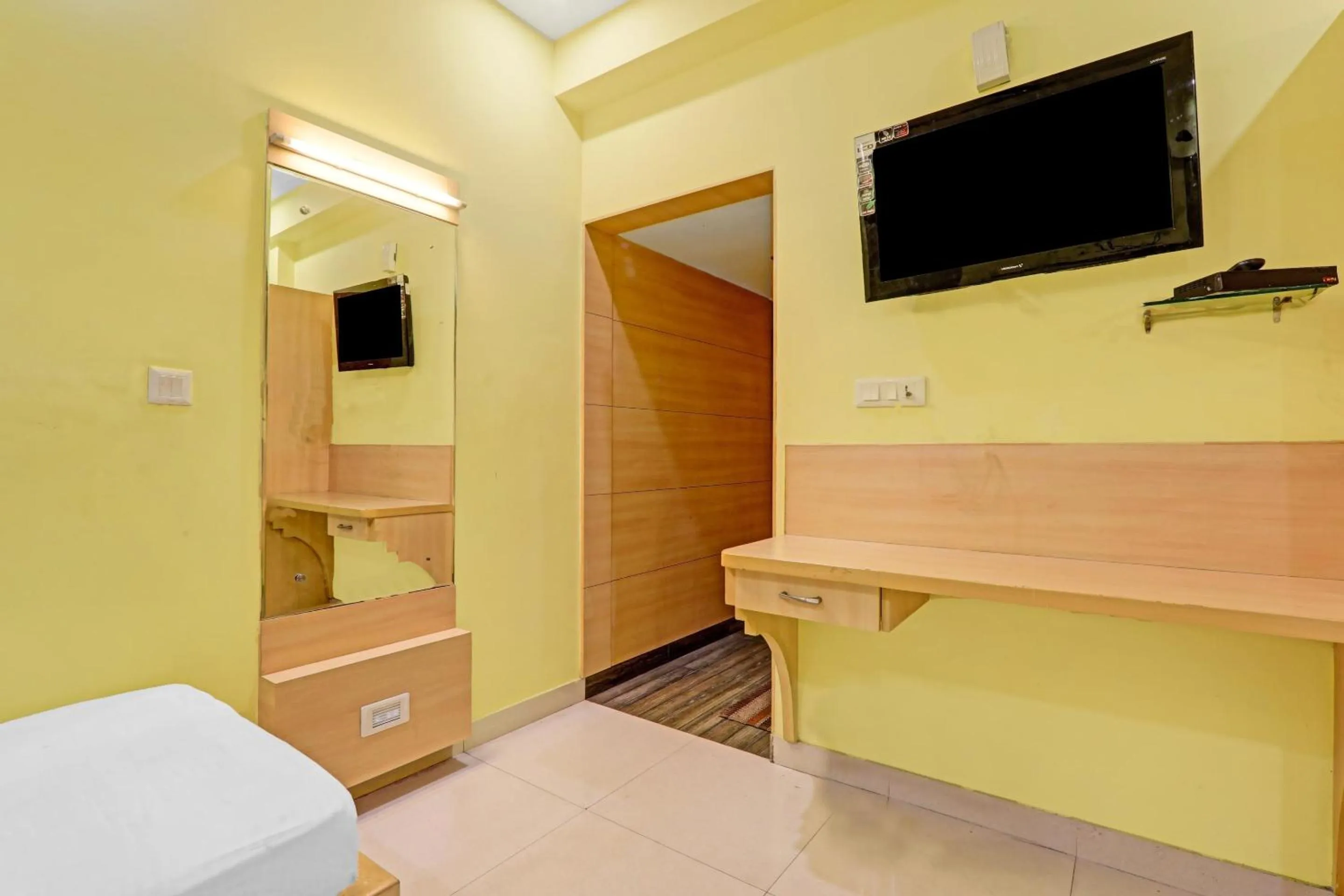 Bedroom, Bed in Super Capital O Townhouse Govinda Royal