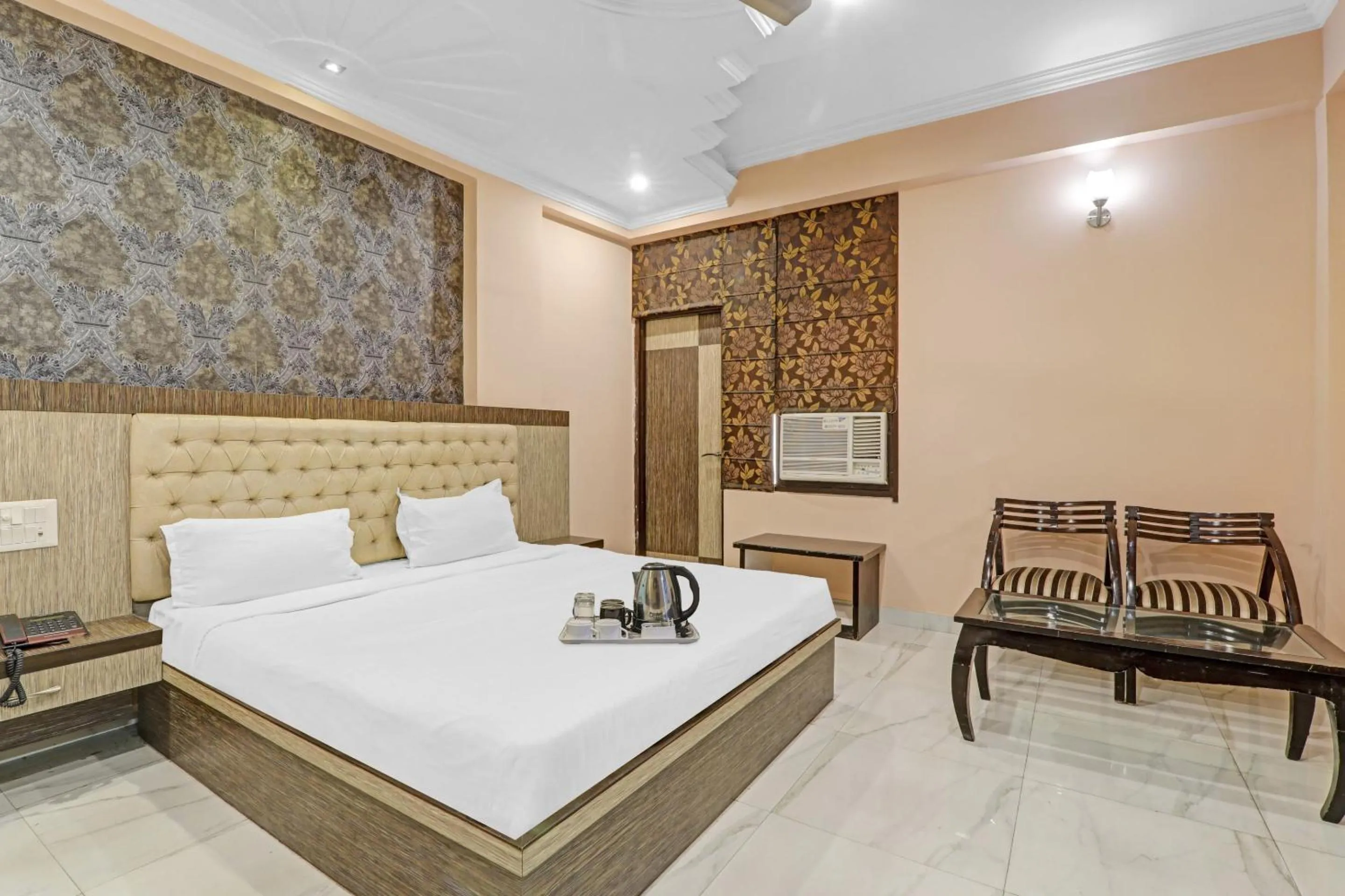 Bedroom, Bed in Super Capital O Townhouse Govinda Royal