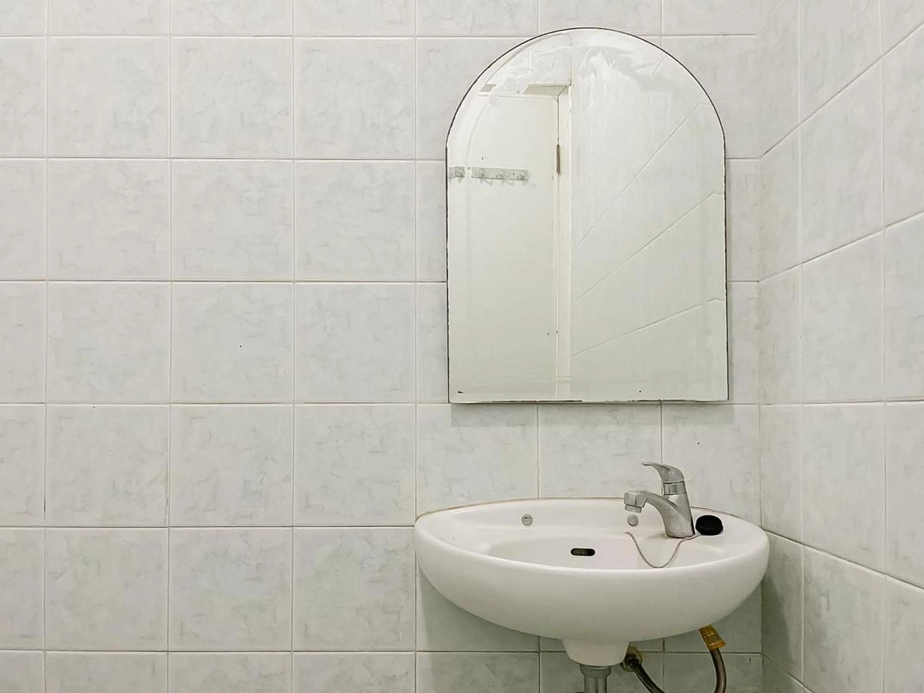 Bathroom in RedDoorz at LeDug Tretes