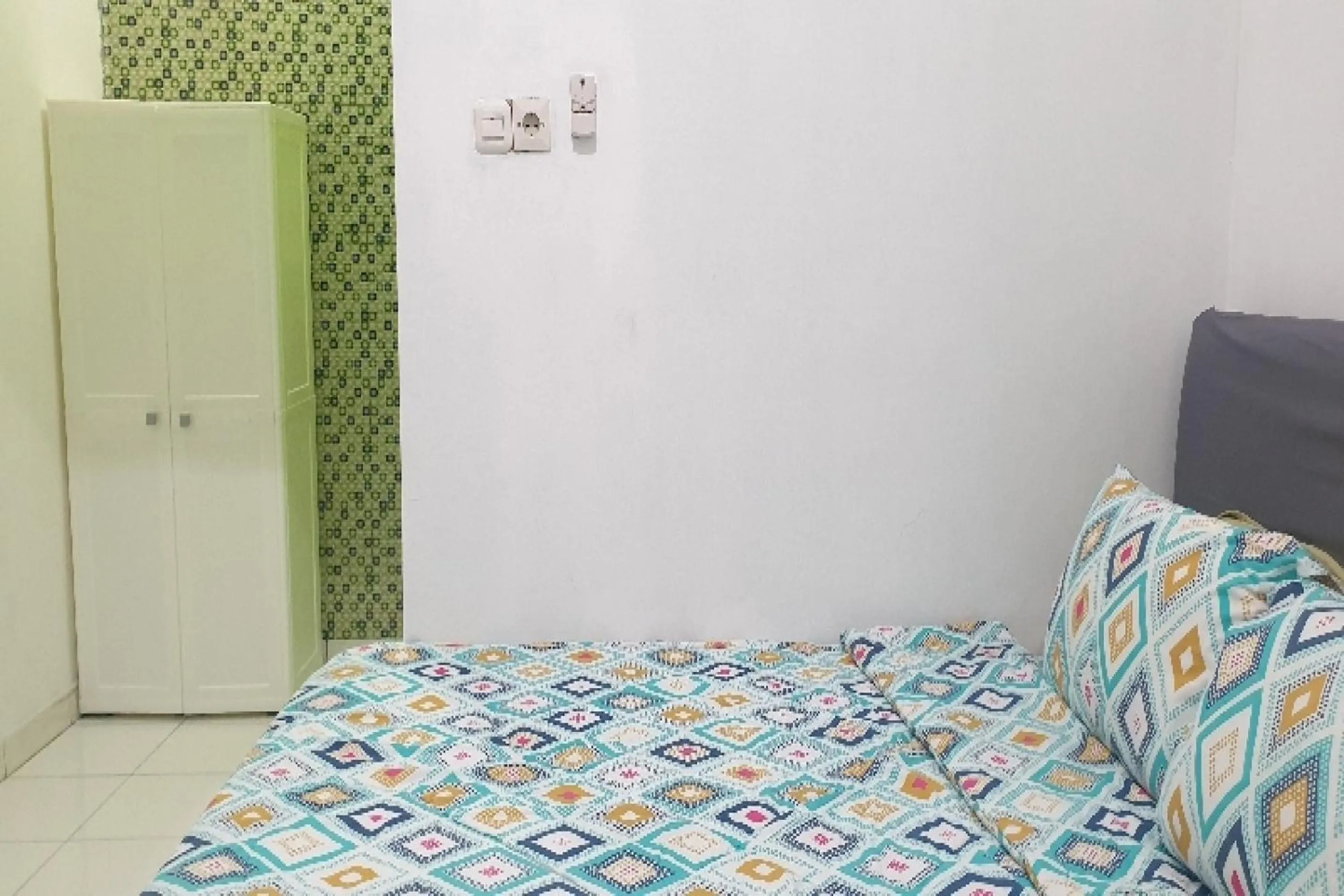 Bedroom in OYO 90990 Surya Residence