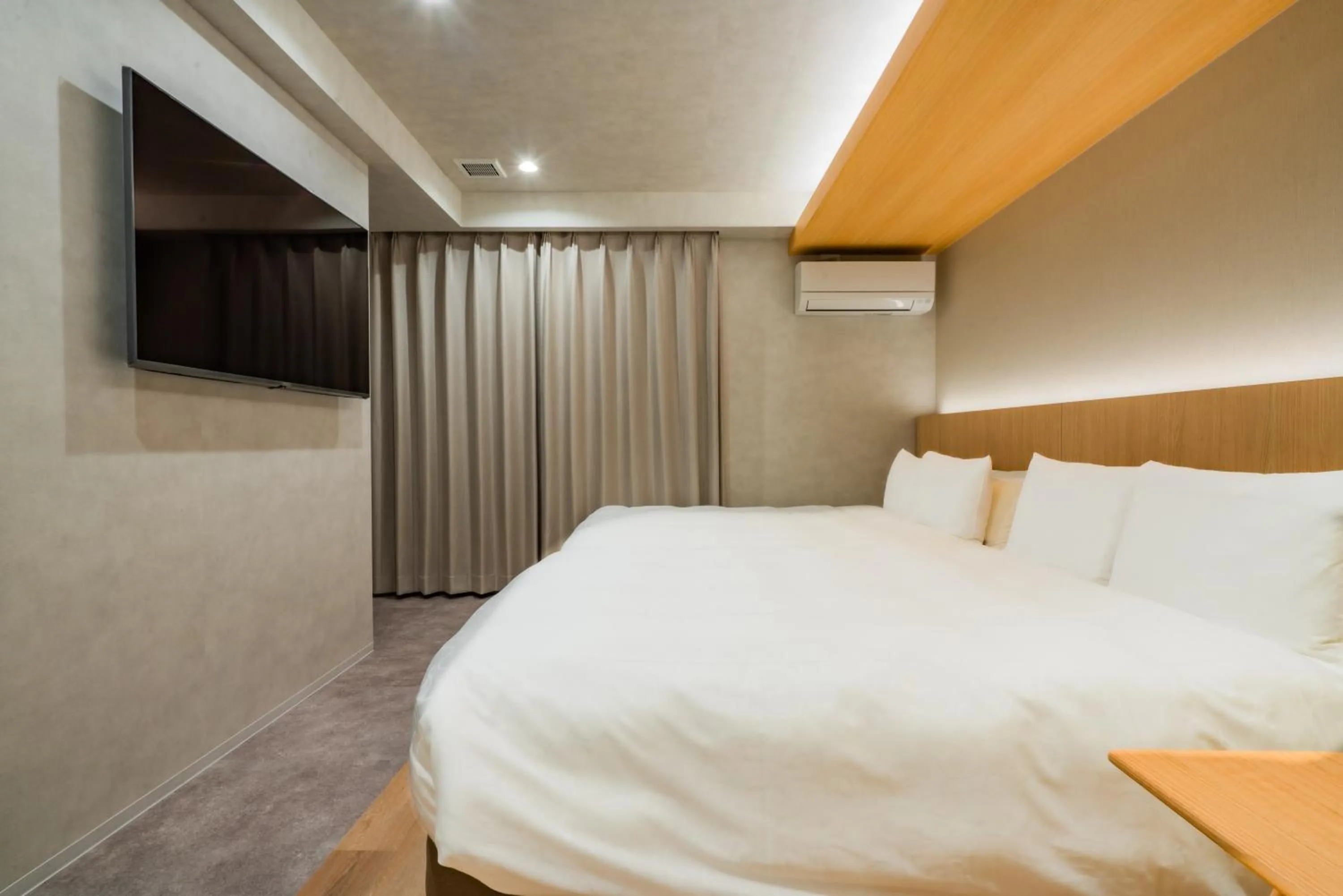 Bed in Randor Hotel Hiroshima Prestige