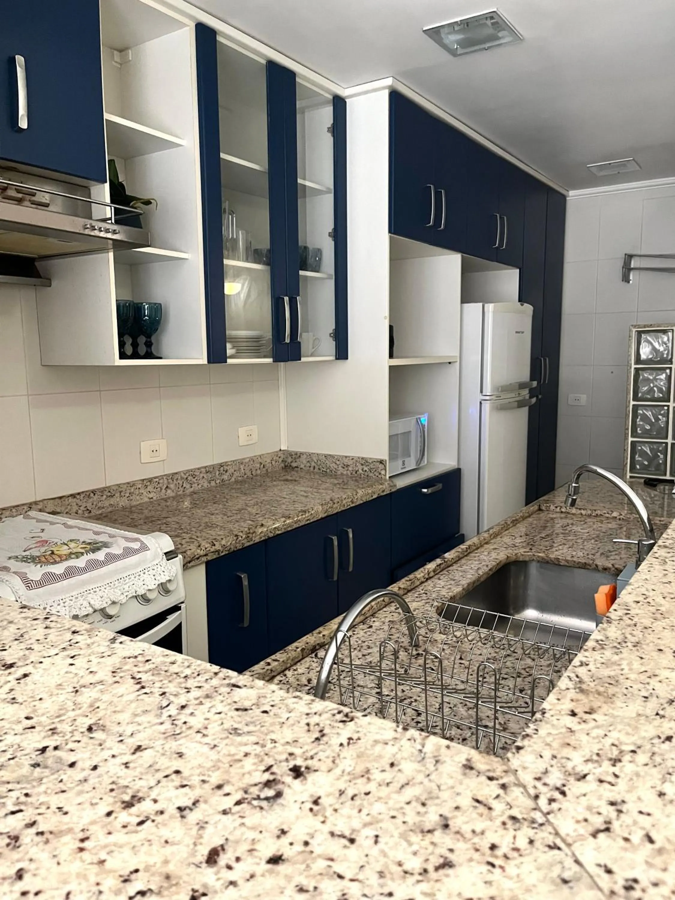 Kitchen or kitchenette in Guarujá Flat