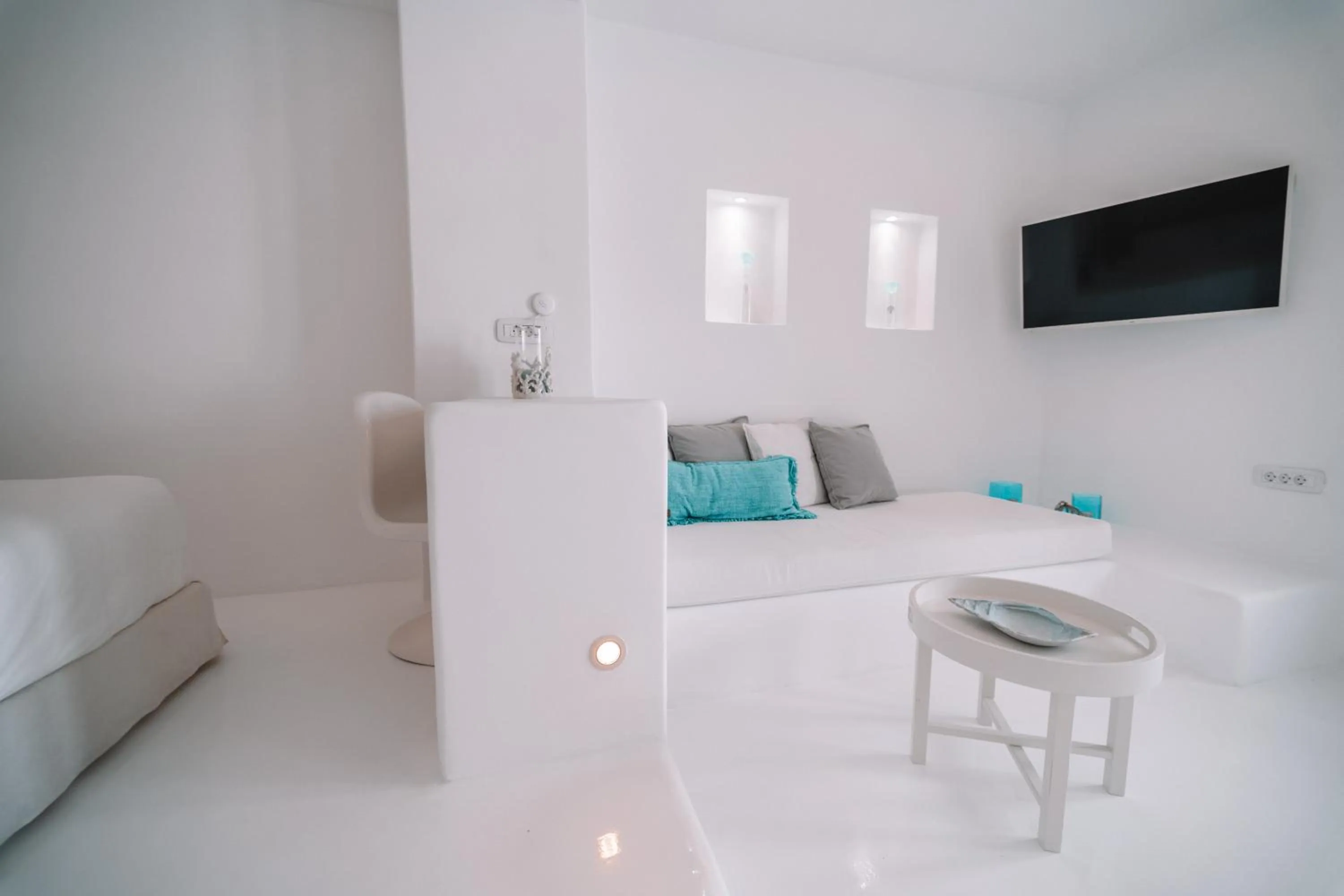 Seating area, Bed in Nelya Suites