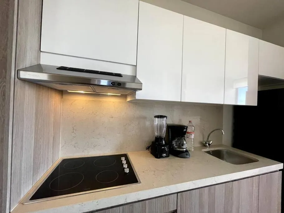 Kitchen or kitchenette in Brand New Condo with Rooftop Pool