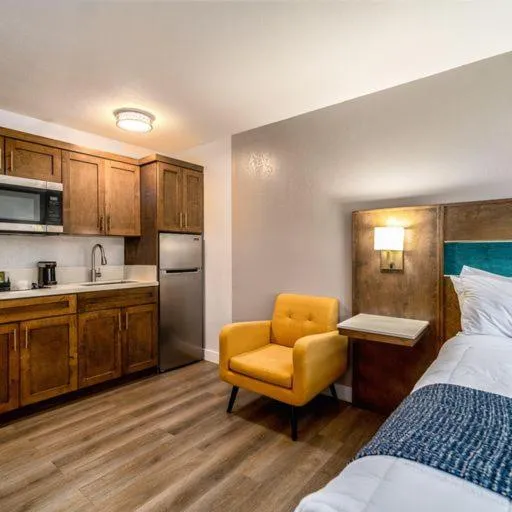 Kitchen or kitchenette, Bed in MainStay Suites Moreno Valley Near March Air Reserve Base