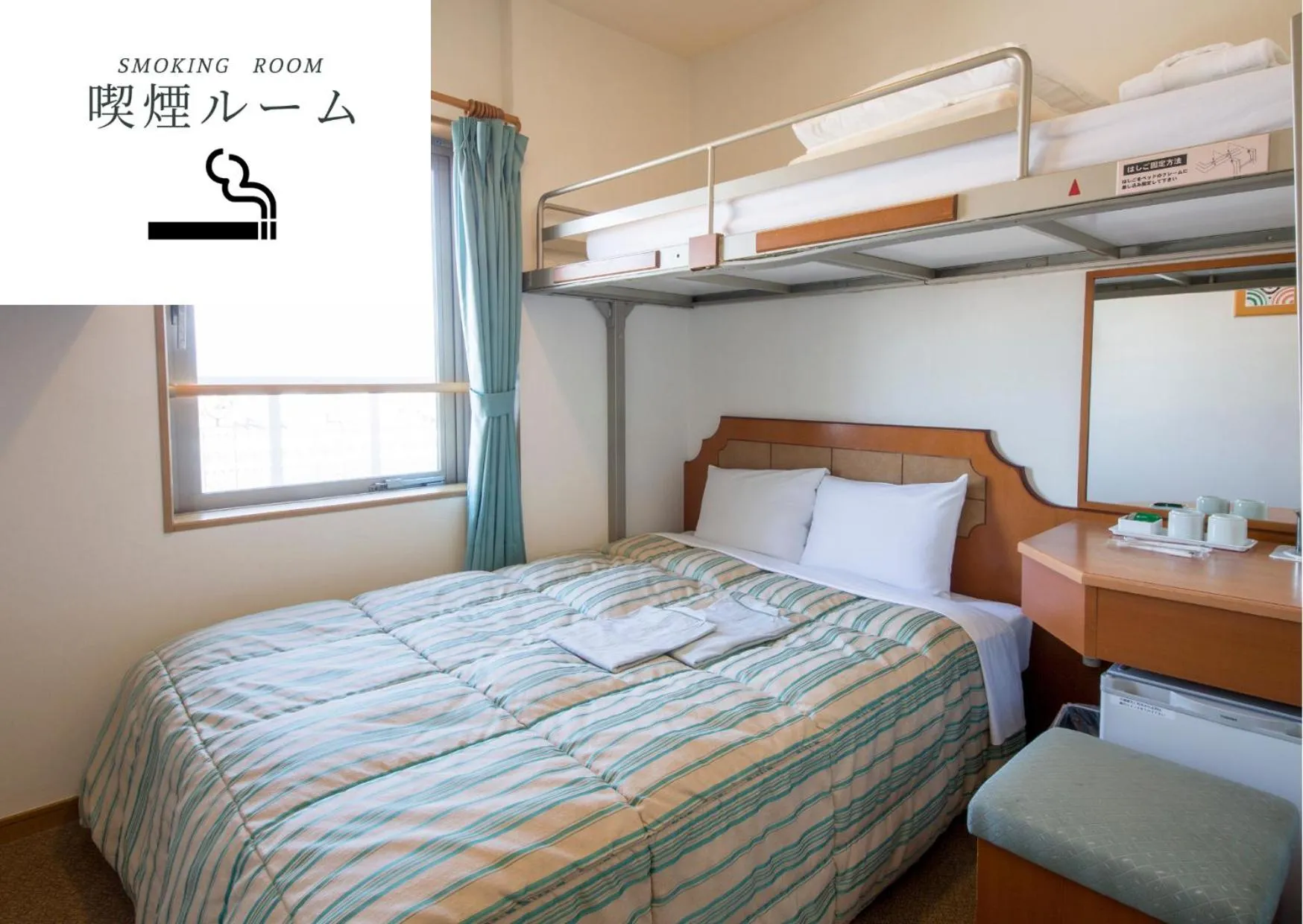 Bed in Hyper Hotel Komatsu