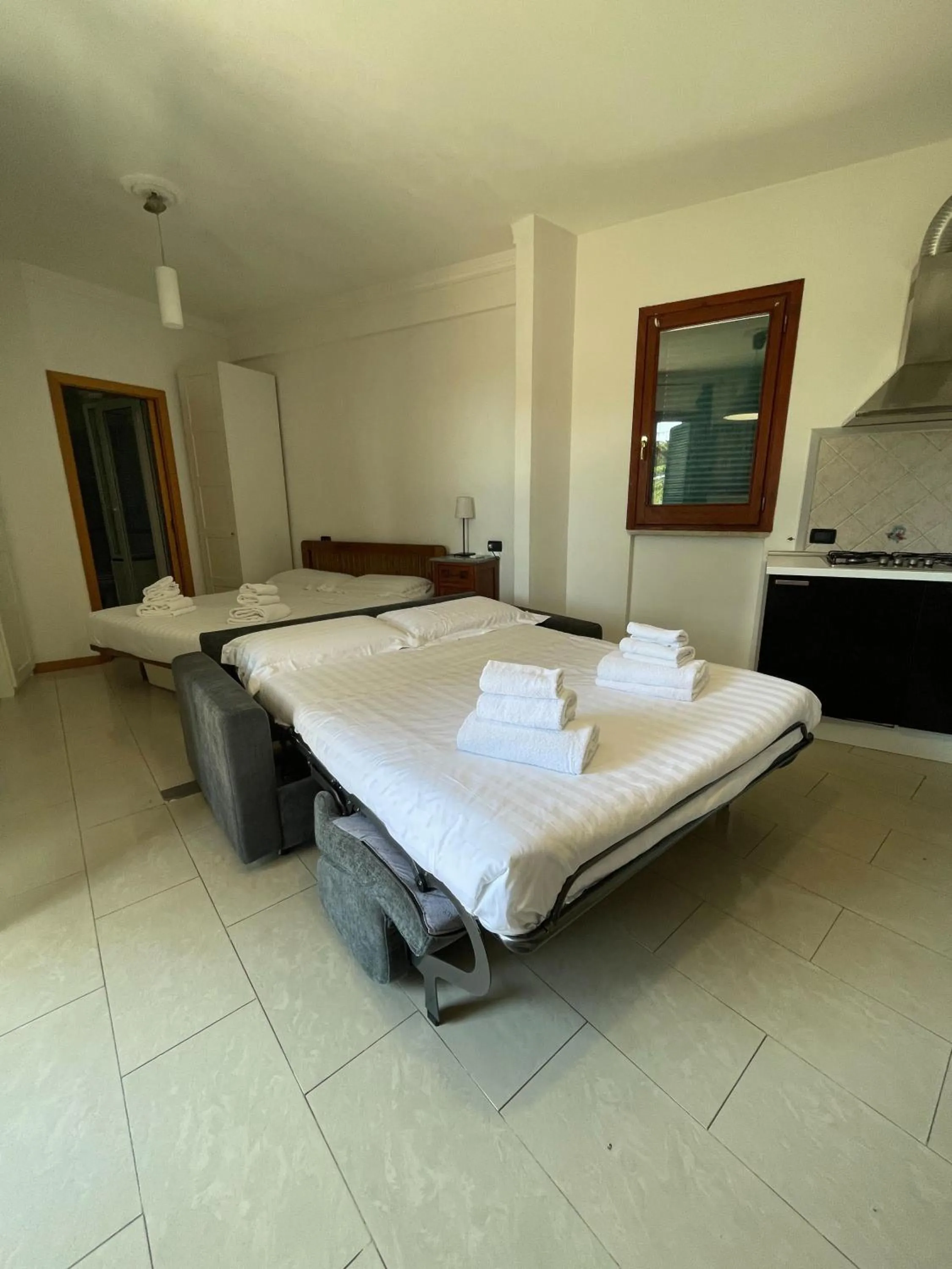 Photo of the whole room, Bed in Flatinrome Residence Fiera