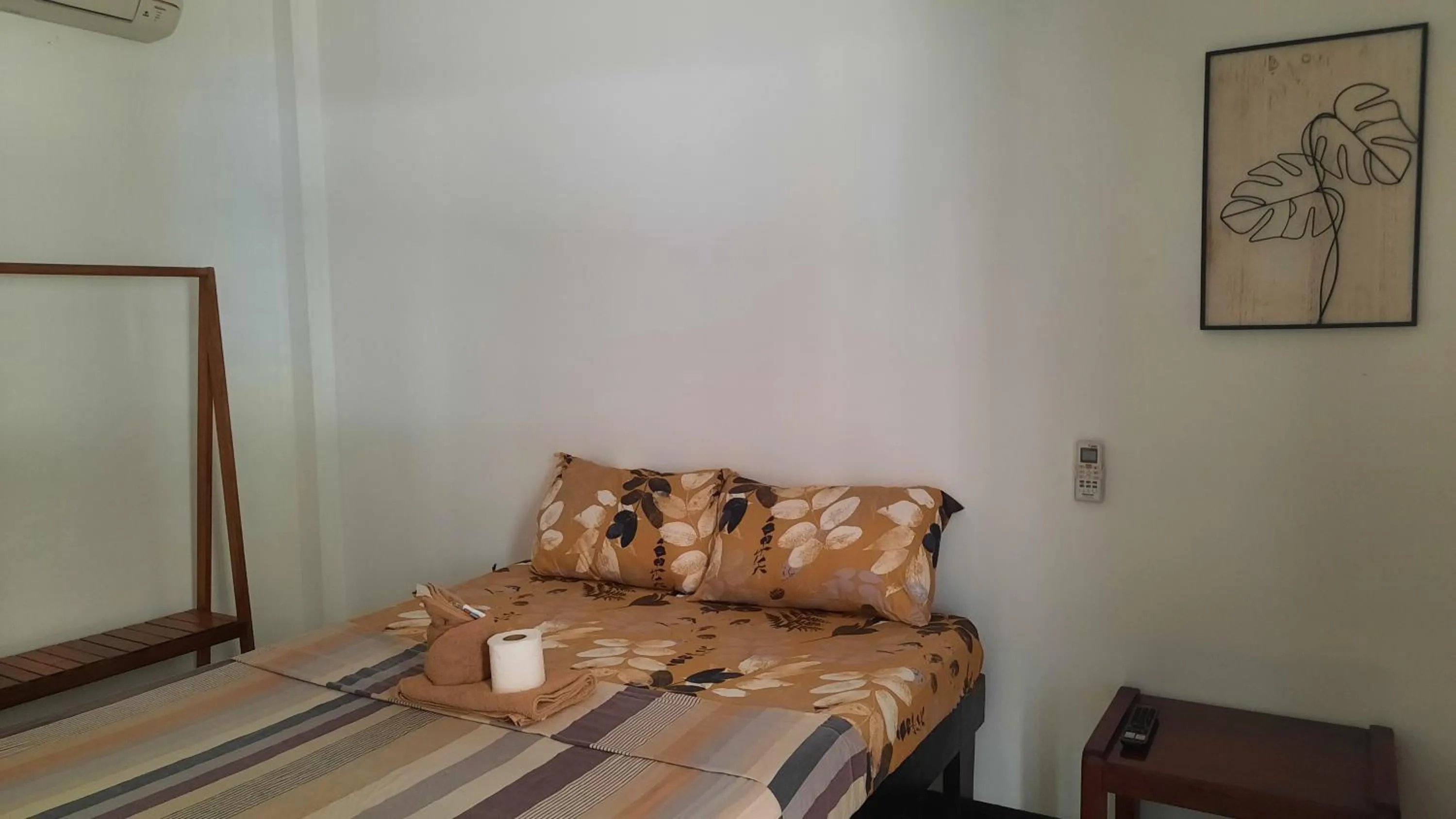 Bed in Lolo Panding Inn