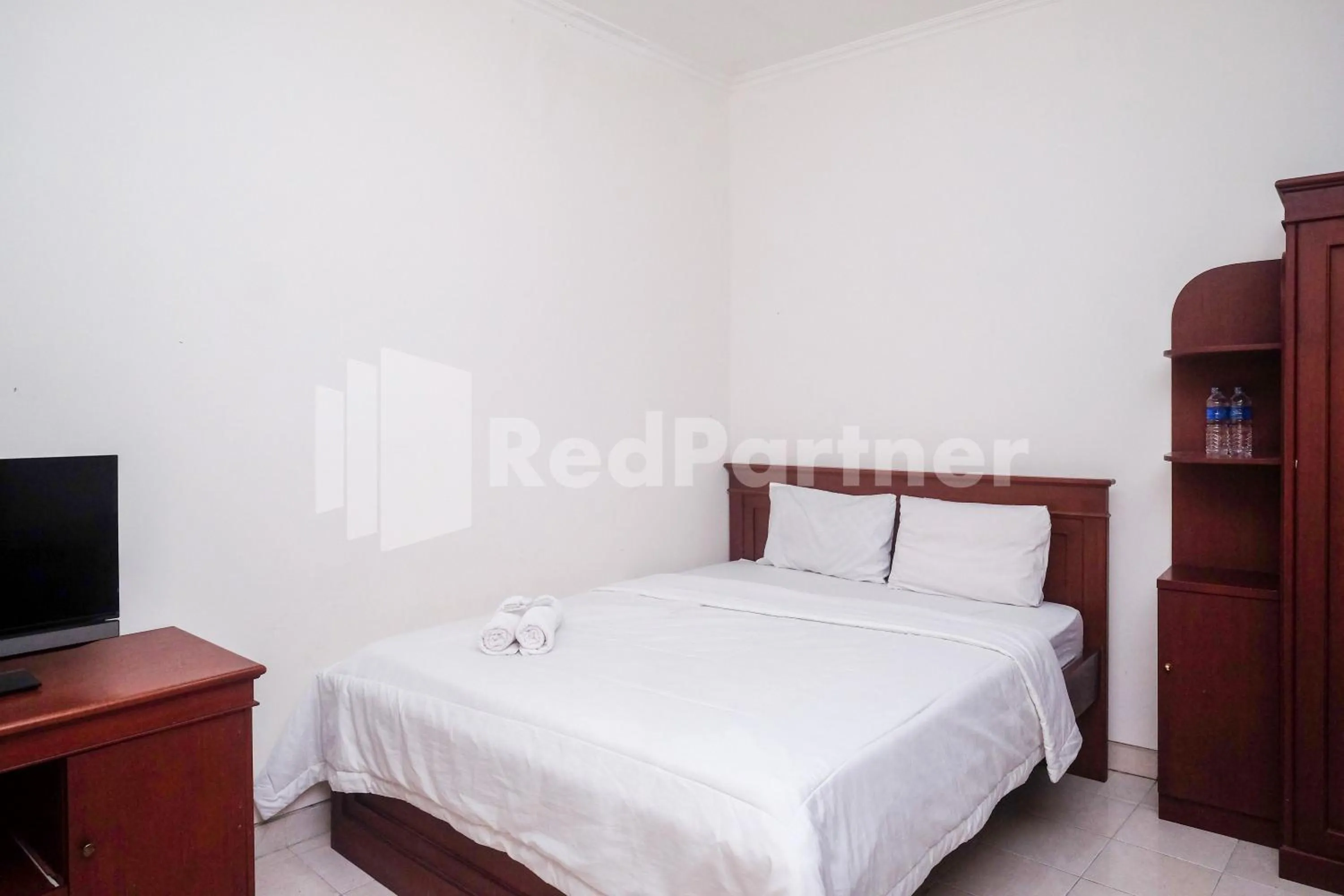 Bed in Griya Fatima Mitra RedDoorz near UGM