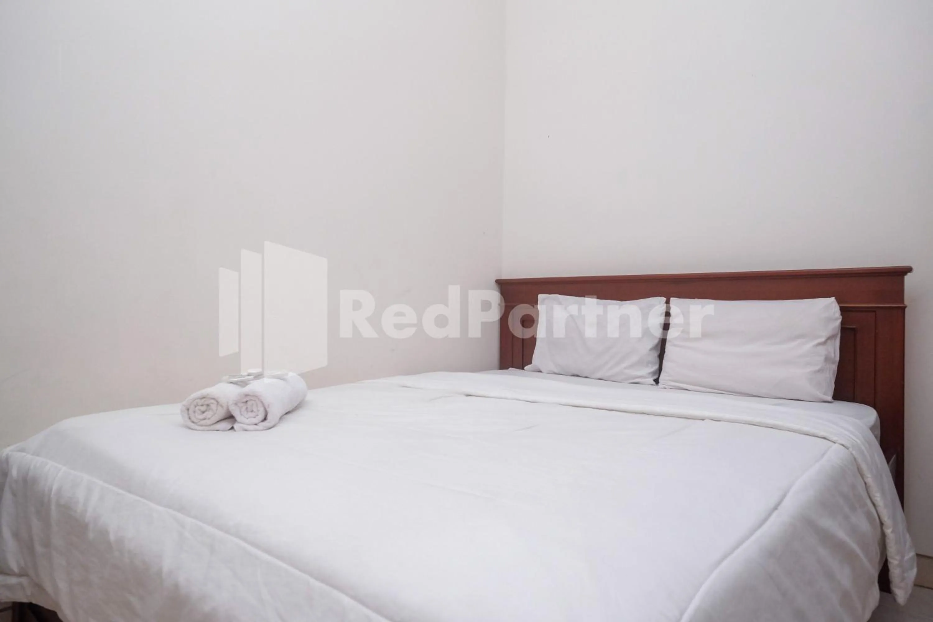 Bed in Griya Fatima Mitra RedDoorz near UGM