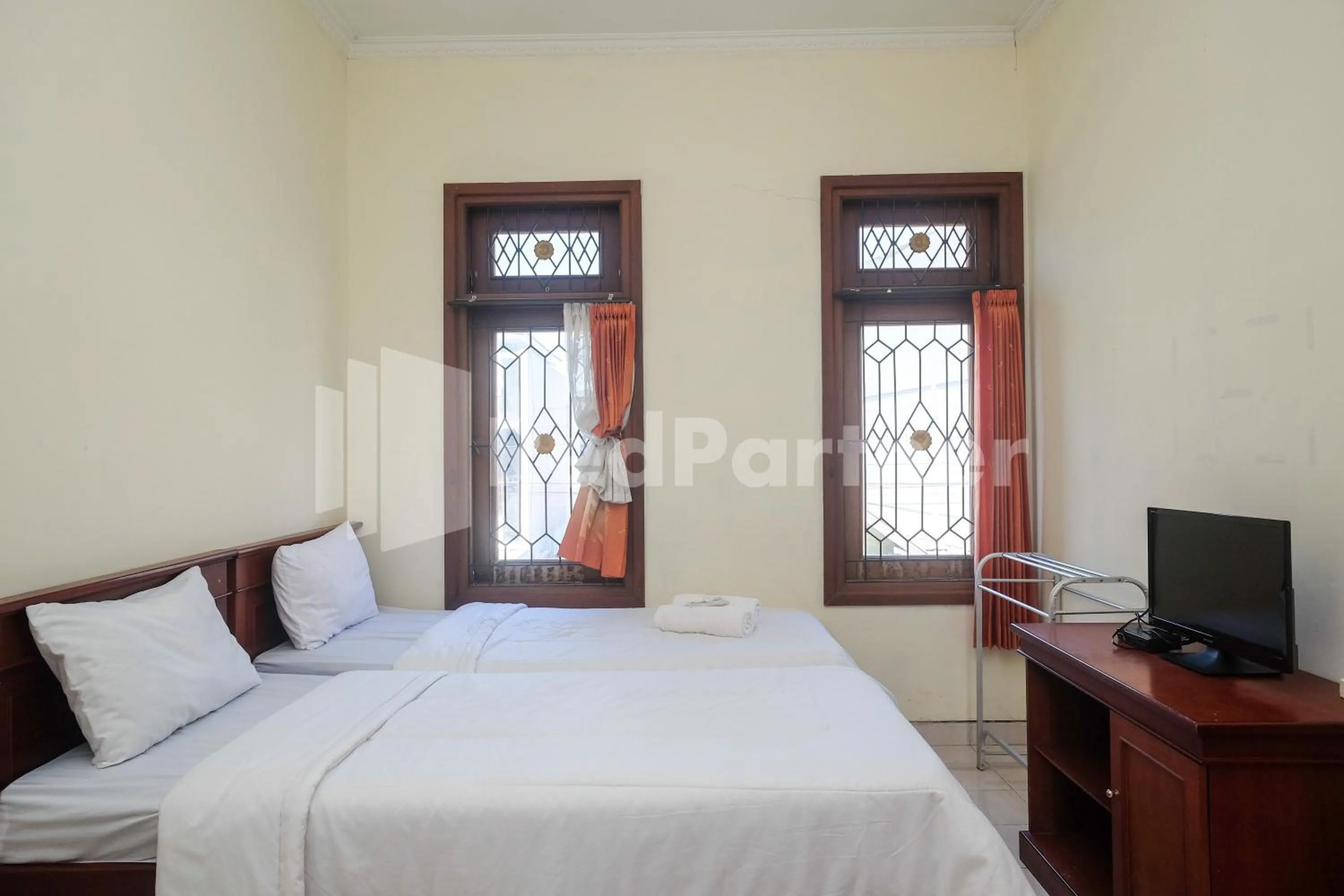 Bed in Griya Fatima Mitra RedDoorz near UGM