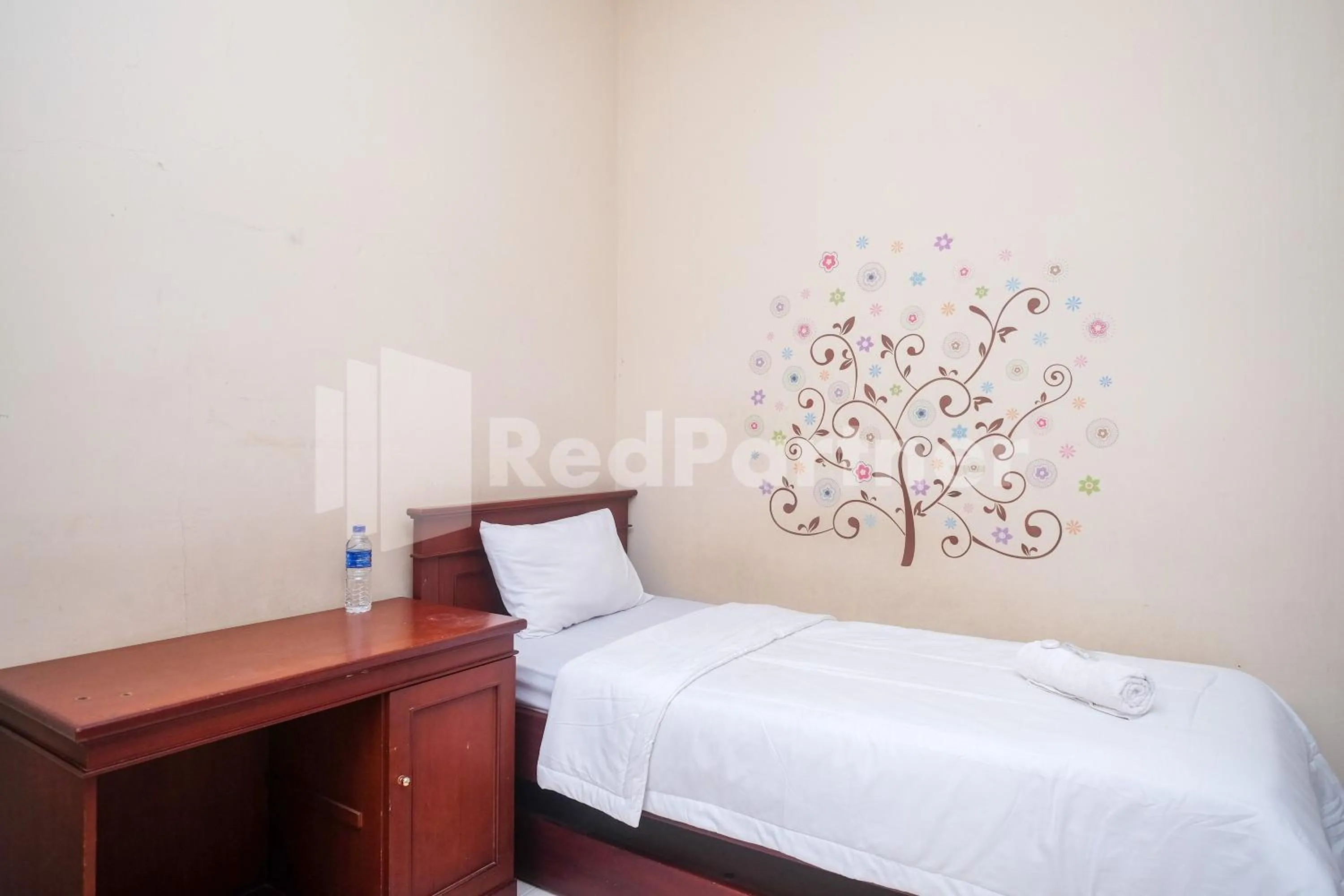 Bed in Griya Fatima Mitra RedDoorz near UGM