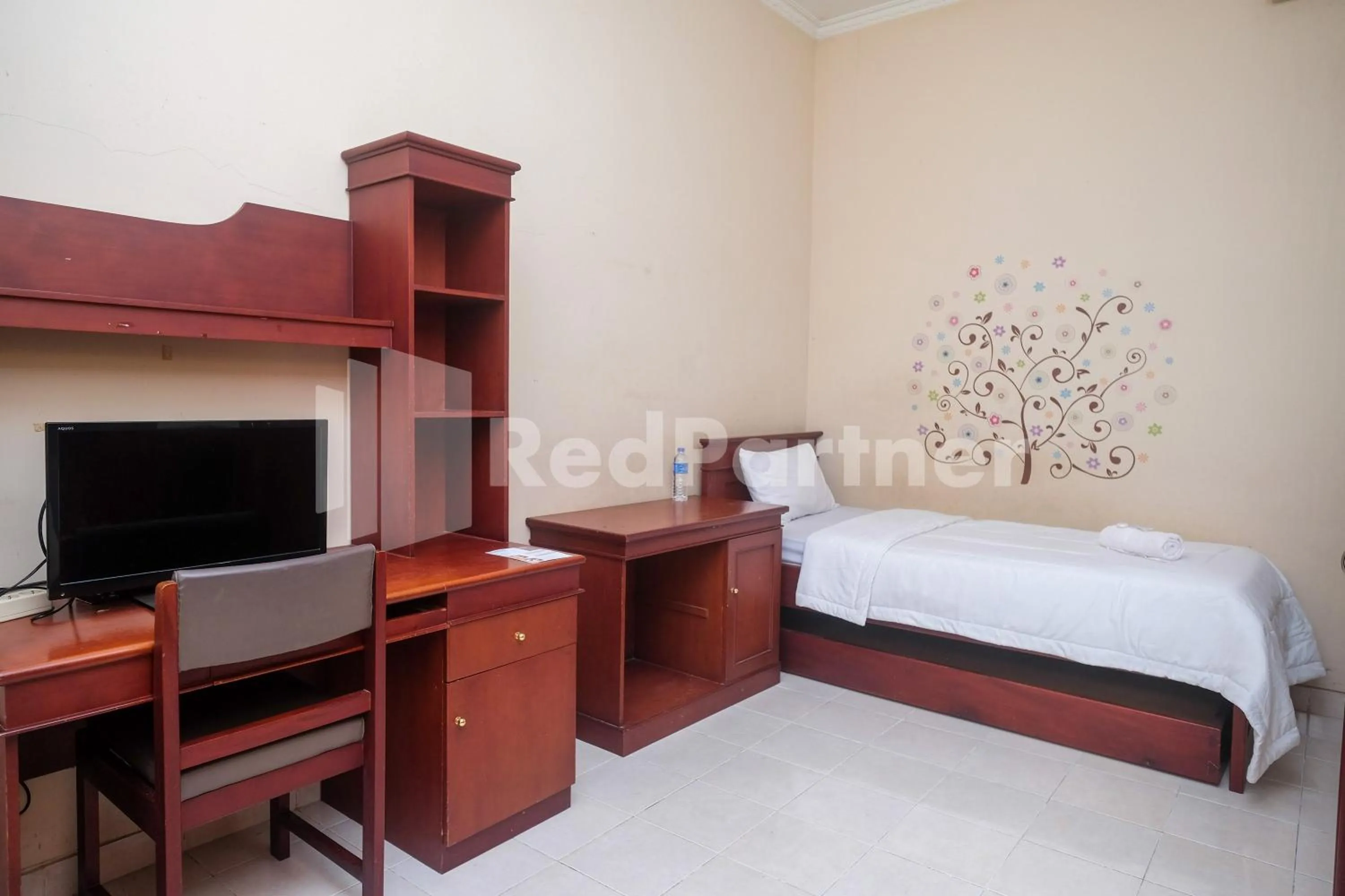 Bed in Griya Fatima Mitra RedDoorz near UGM