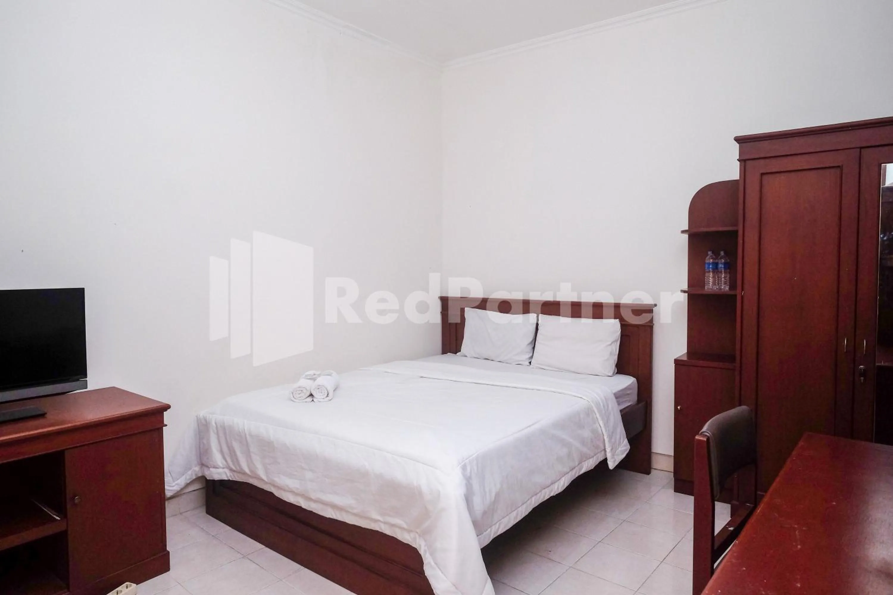 Bed in Griya Fatima Mitra RedDoorz near UGM