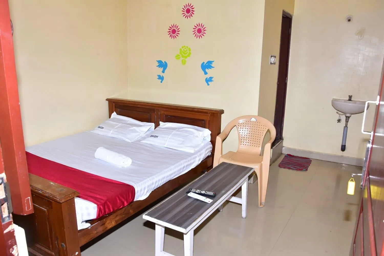 Bed in Sri Krishna Guest House