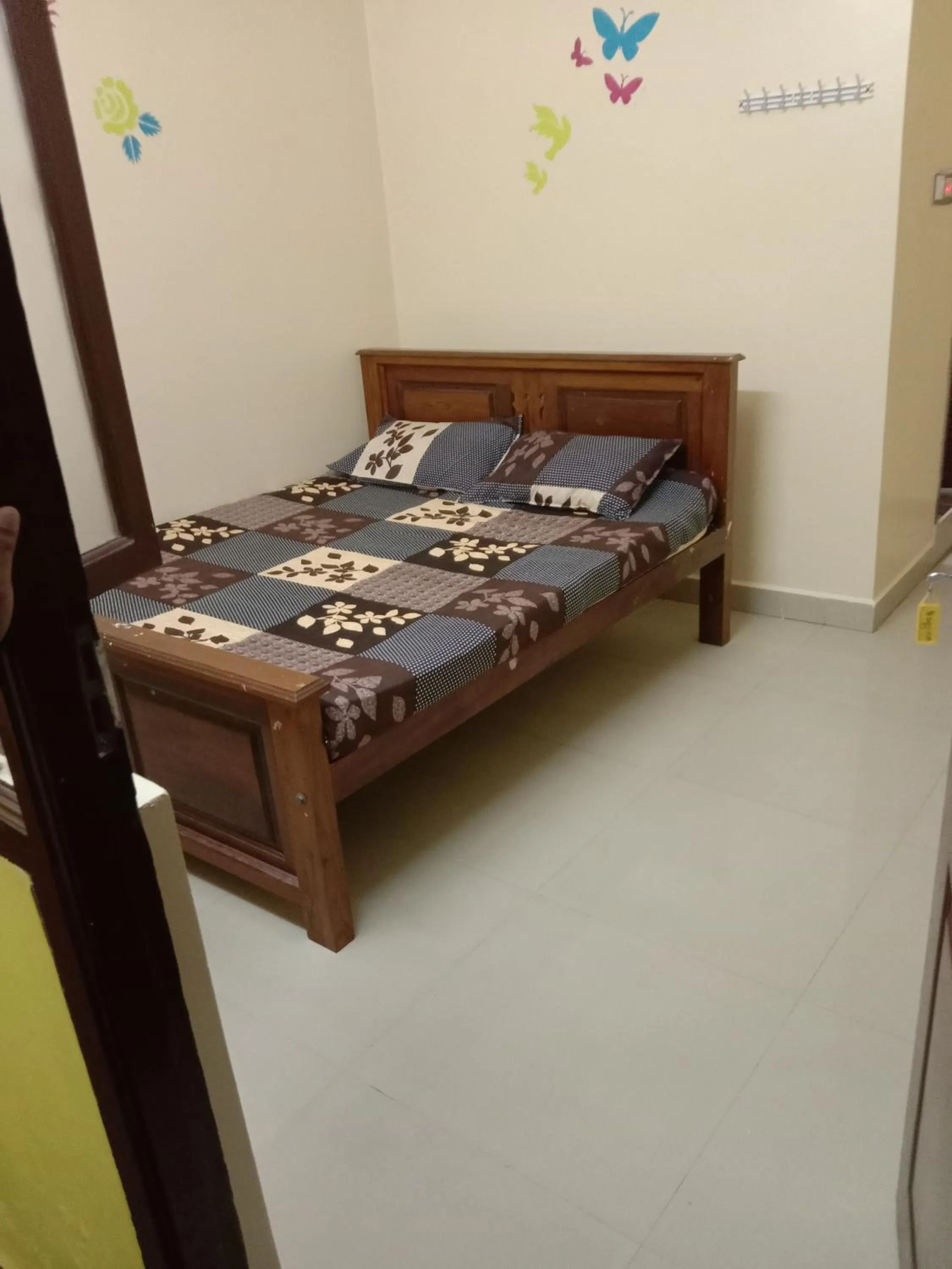 Bed in Sri Krishna Guest House