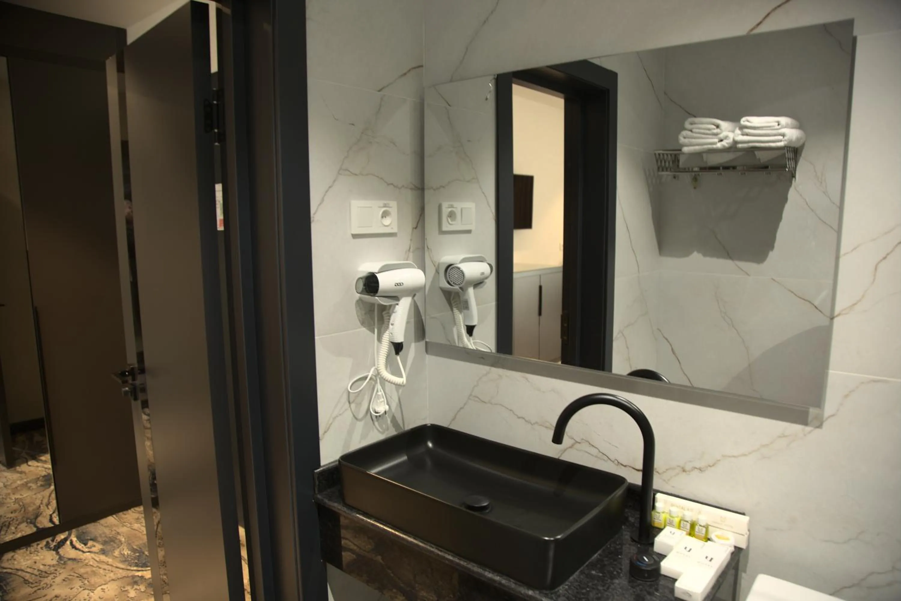 Bathroom in UNIQUE HOTEL