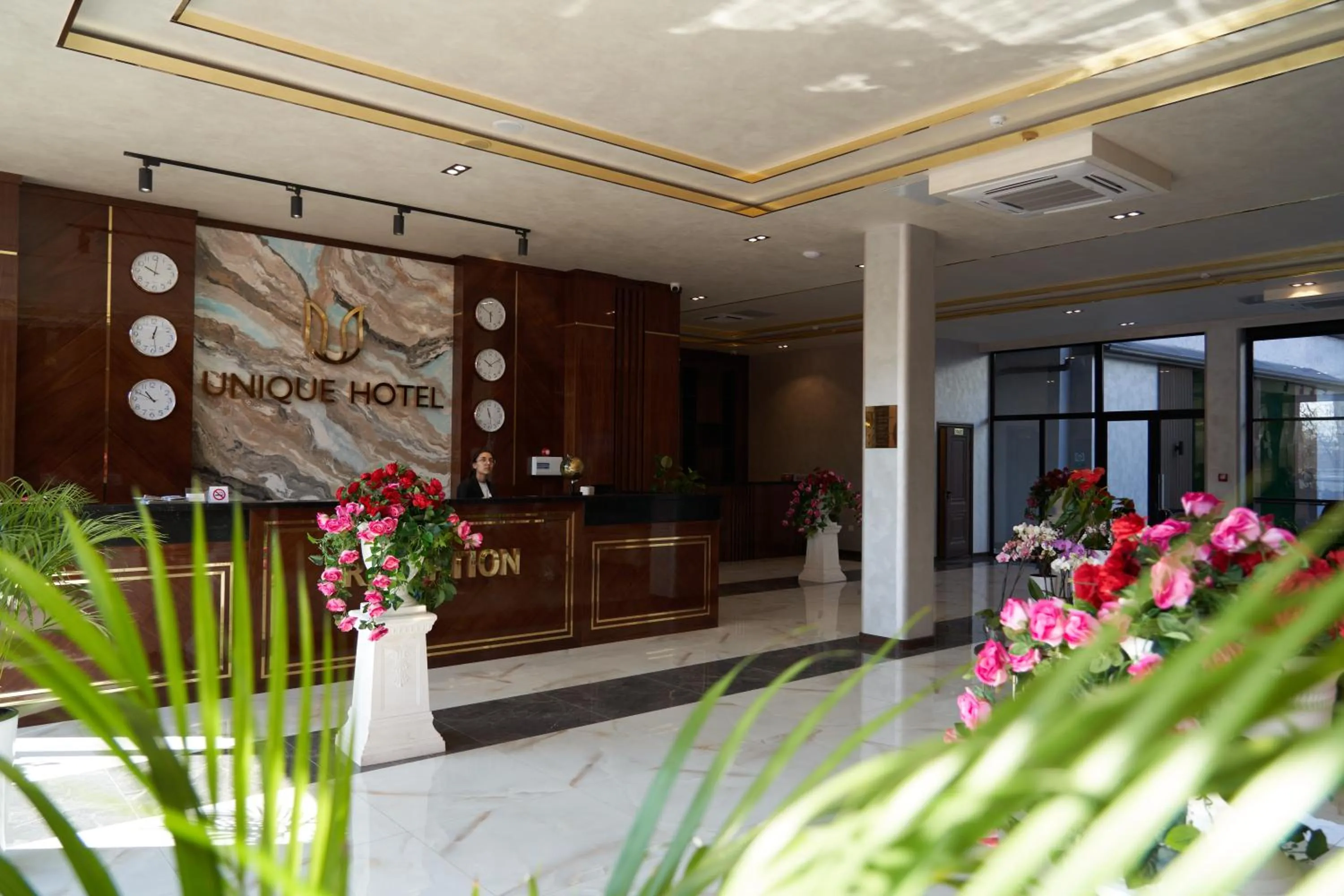 Lobby or reception in UNIQUE HOTEL