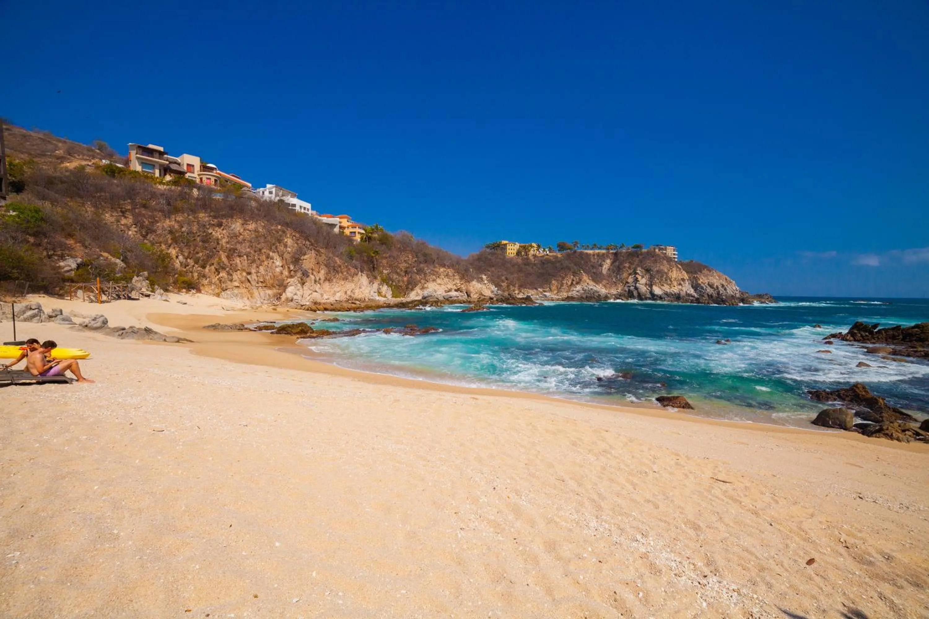 Beach in Coral Blue Huatulco All Inclusive