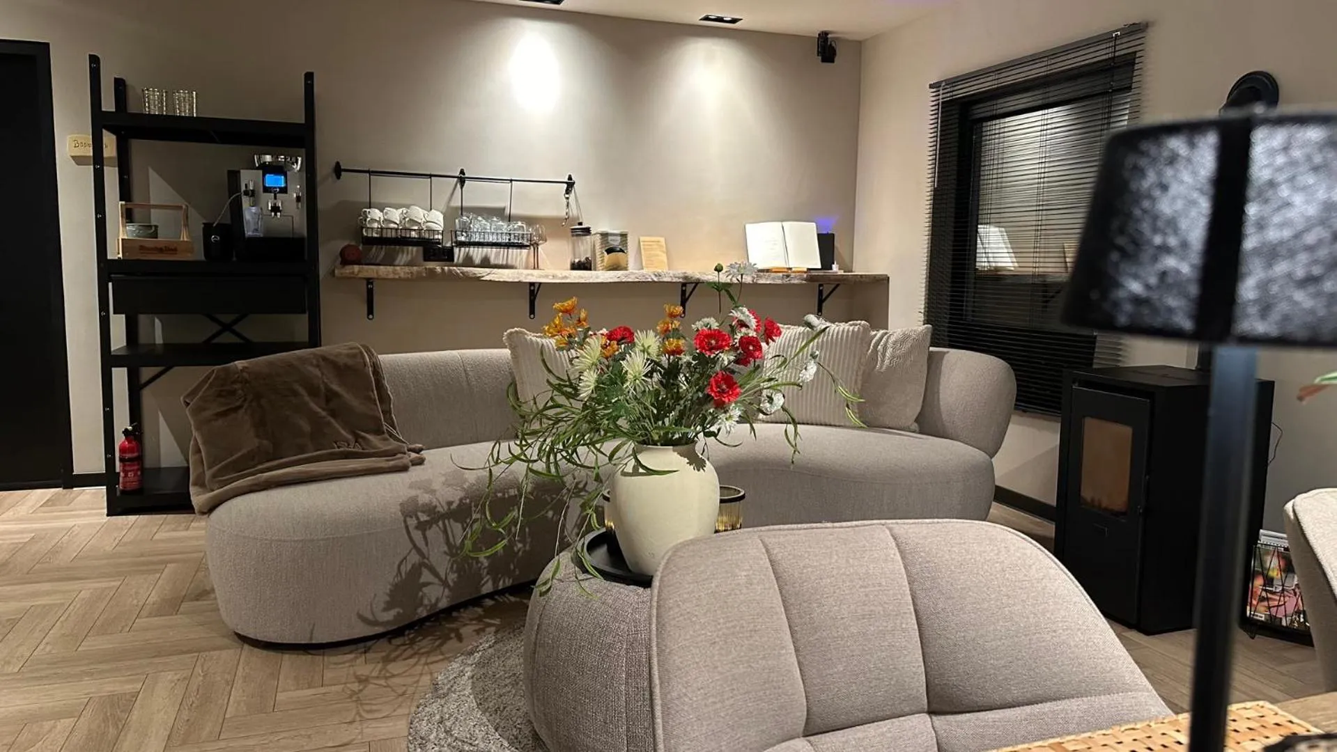 Communal lounge/ TV room in Boutique Hotel Le Faucon