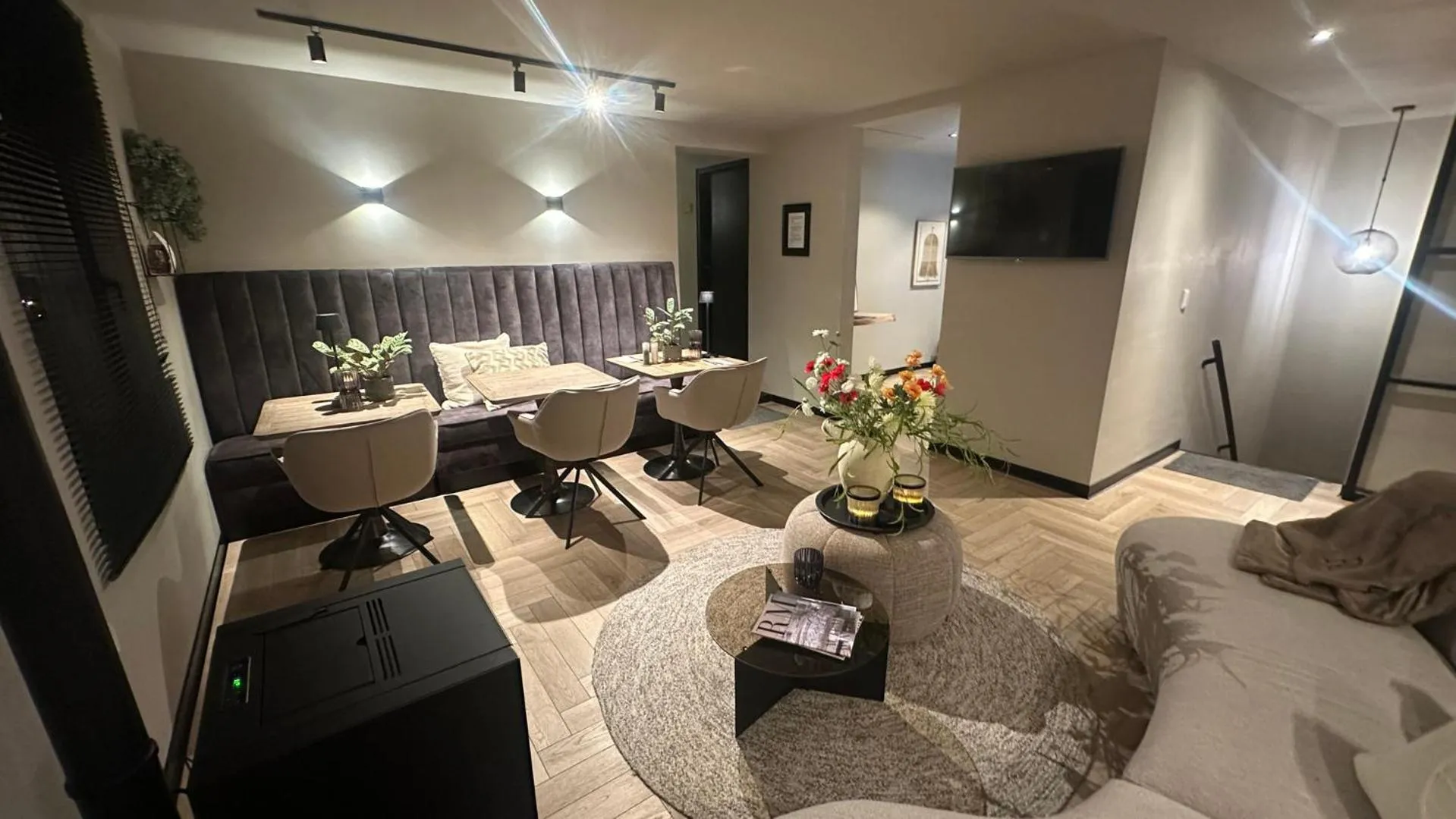 Communal lounge/ TV room in Boutique Hotel Le Faucon