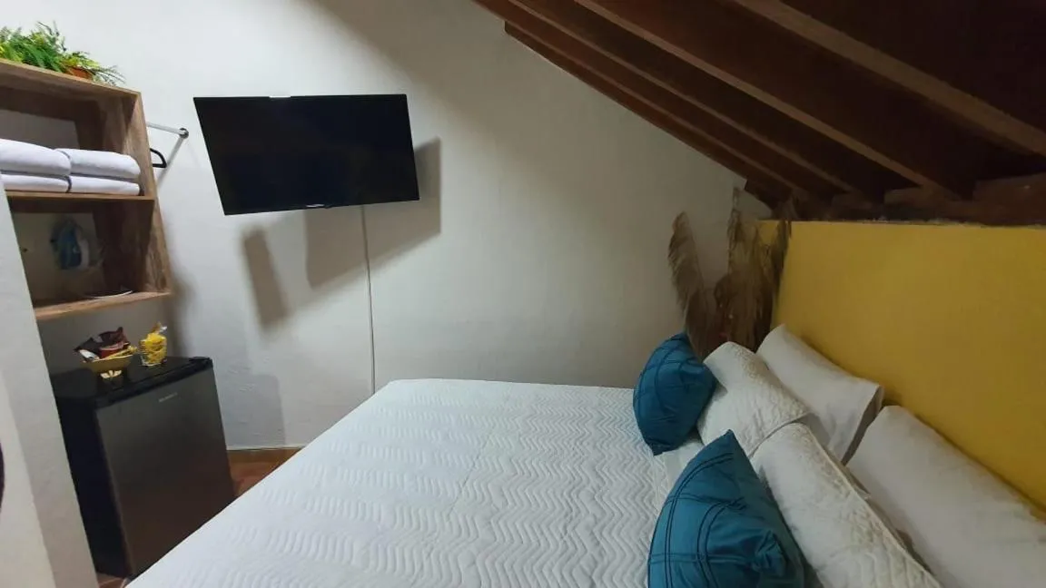 Bed in Candilejo Hotel Boutique