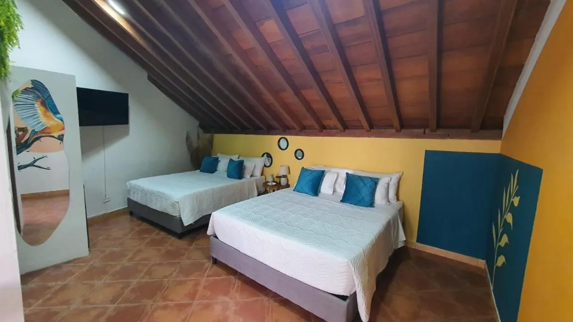 Bed in Candilejo Hotel Boutique