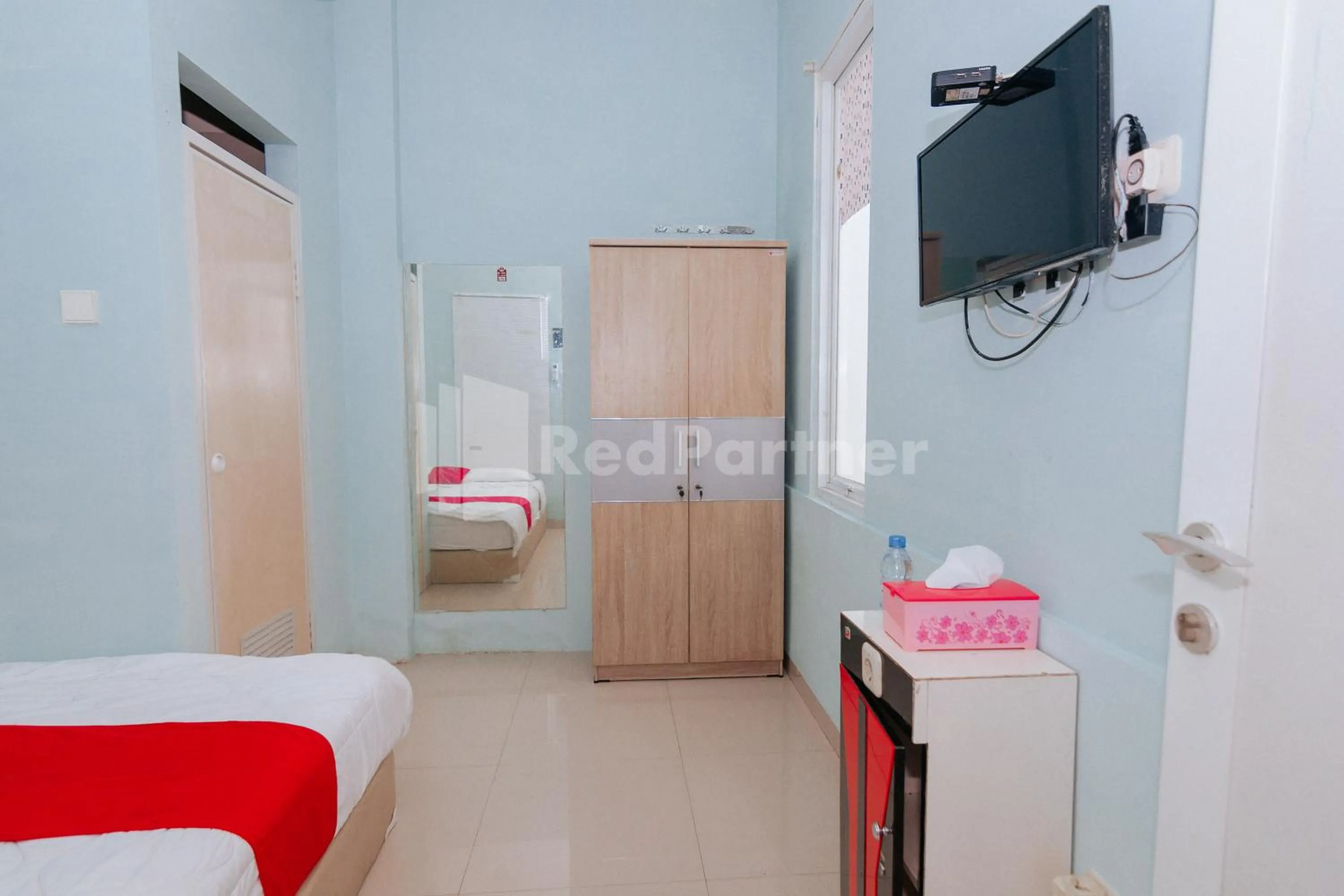 Bedroom, Bed in OYO 94494 Krekot Residence Pasar Baru COO Property
