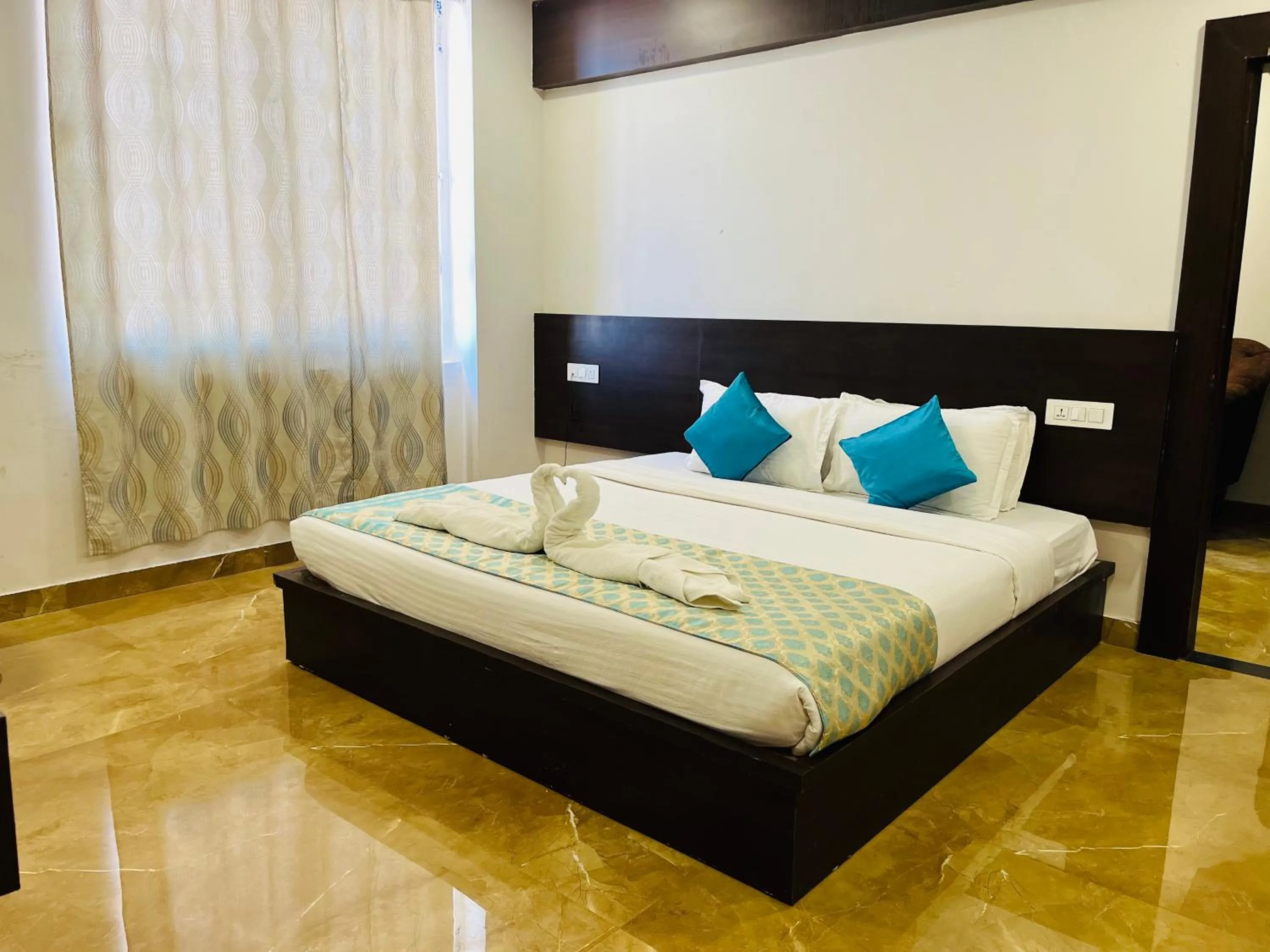 Bed in Hotel Elite By Signature Group