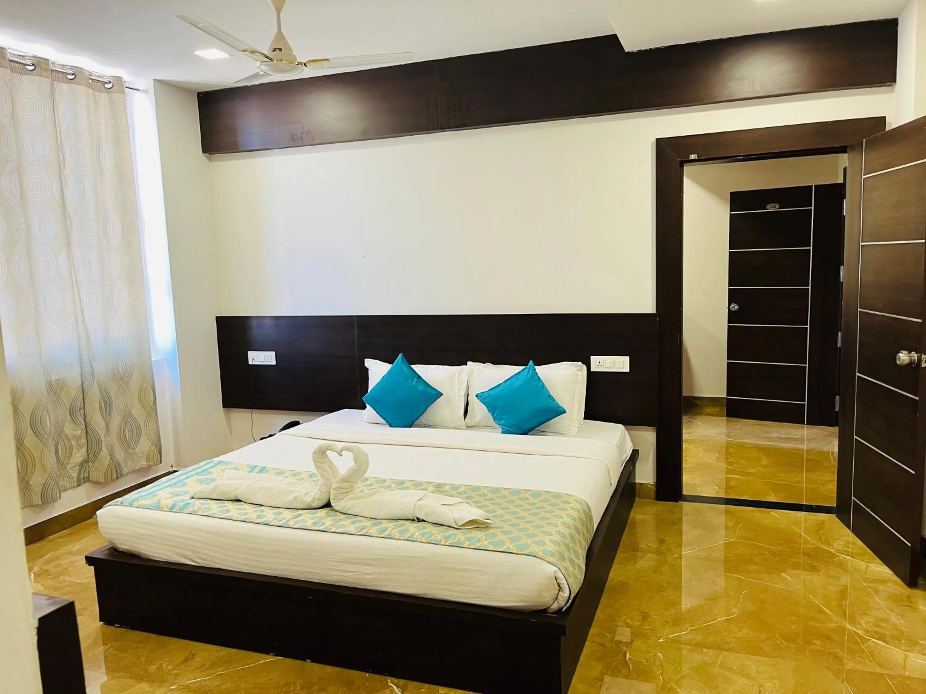 Bed in Hotel Elite By Signature Group