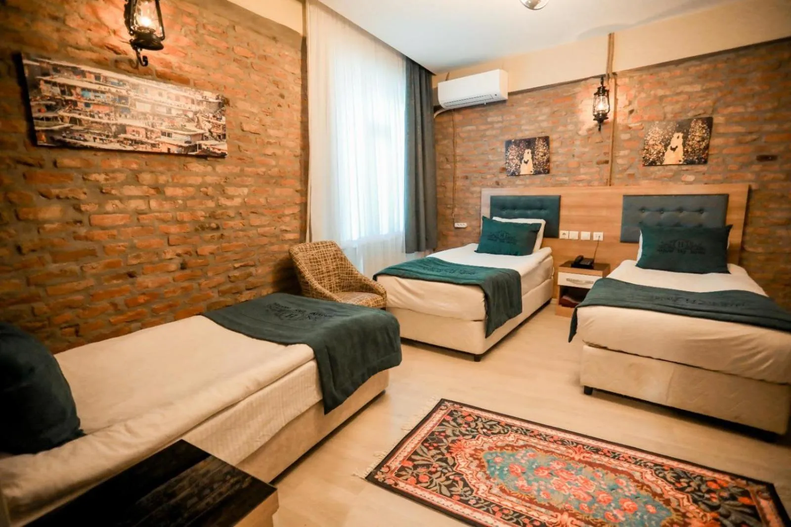 Bed in HASUNİ TAŞ HOTEL