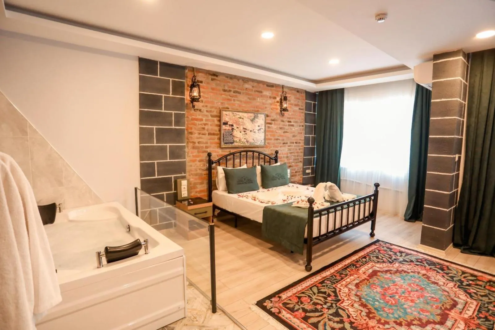 Bed in HASUNİ TAŞ HOTEL