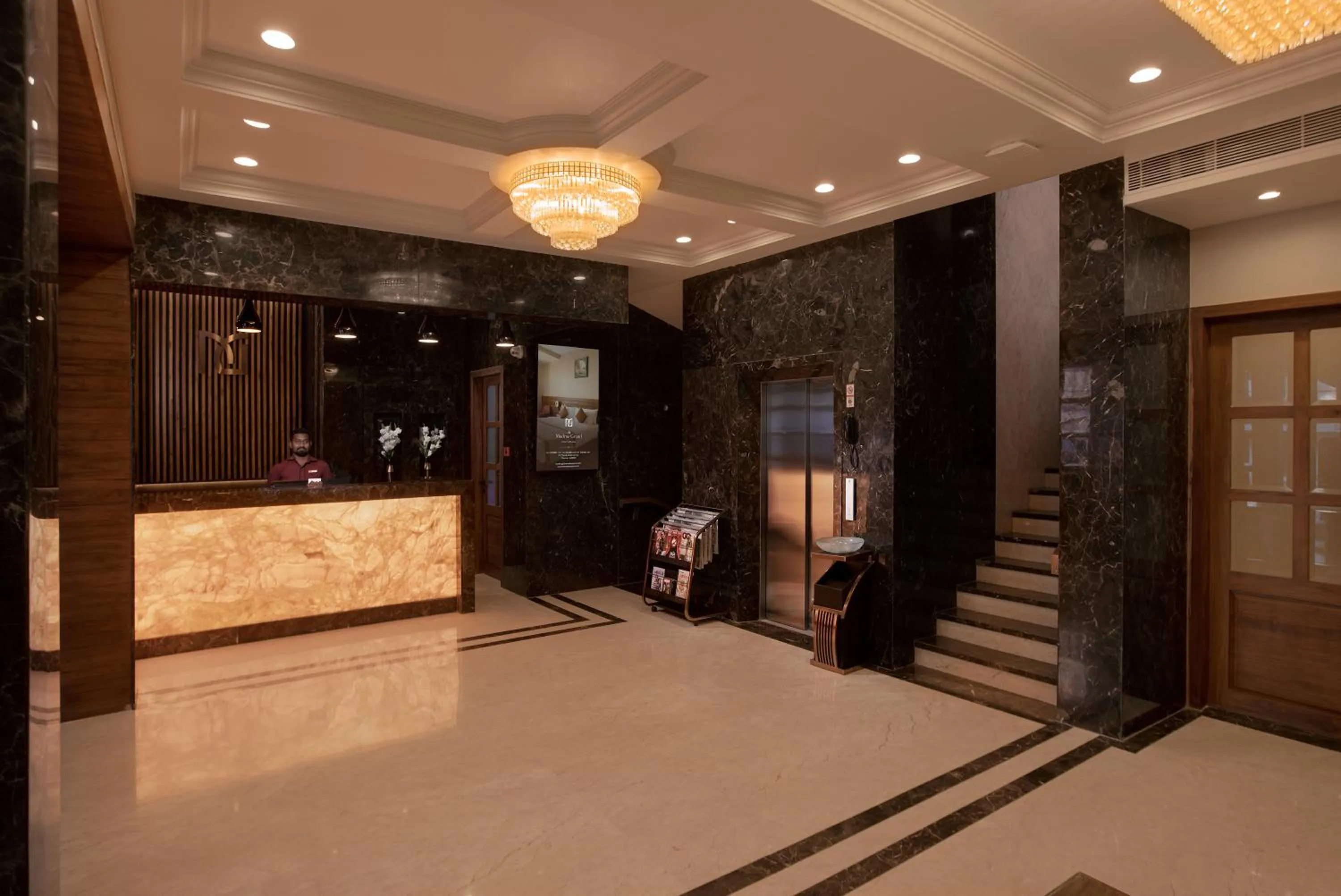 Lobby or reception in The Madras Grand