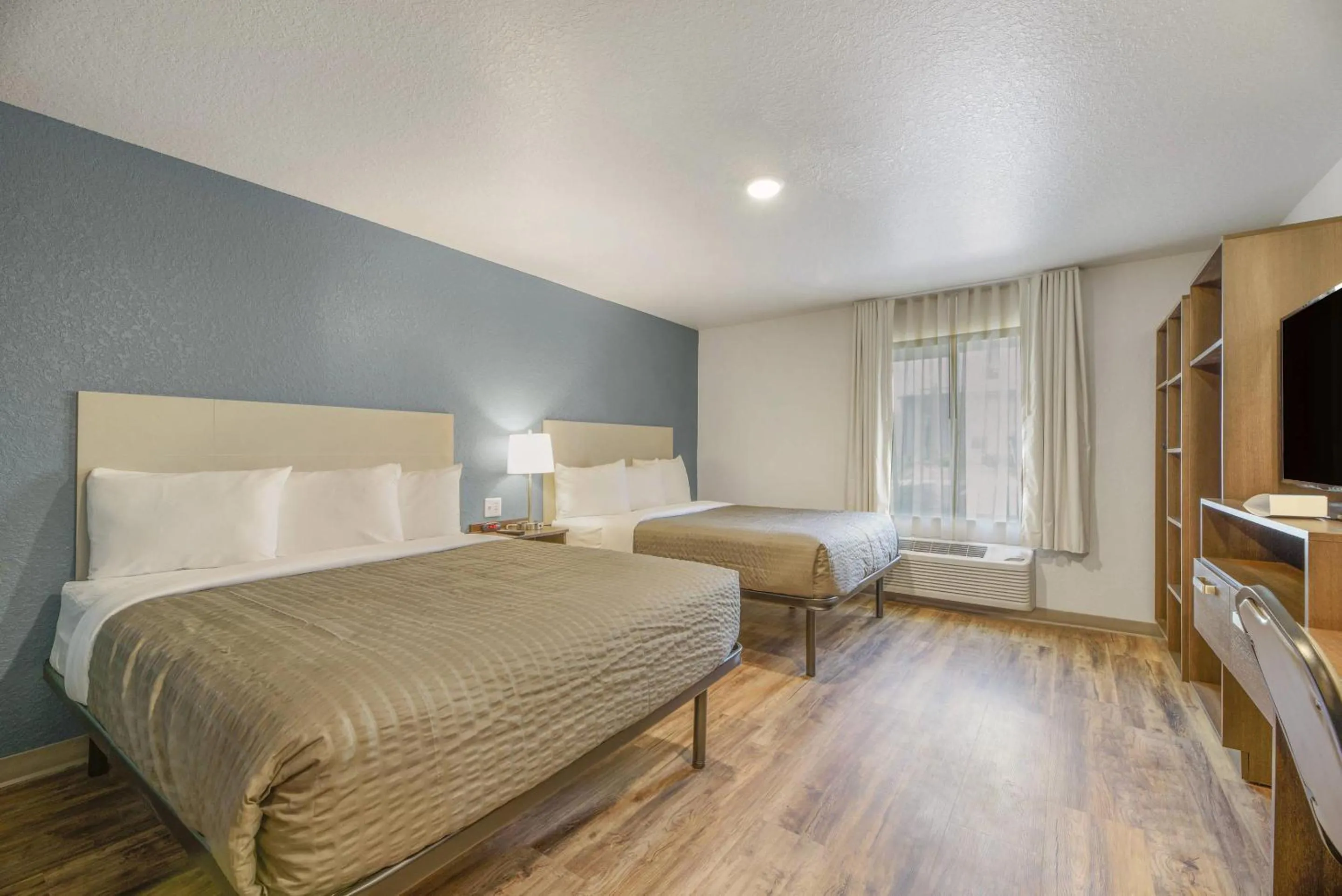 Bedroom, Bed in WoodSpring Suites Orlando I-4 & Convention Center