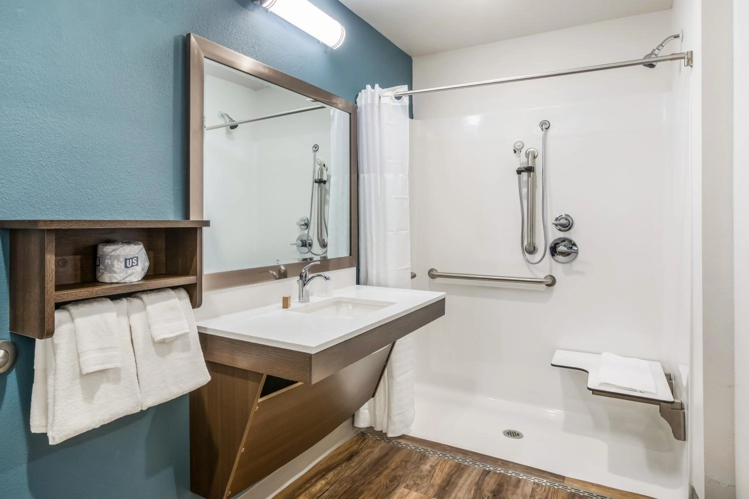 Bathroom in WoodSpring Suites Orlando I-4 & Convention Center