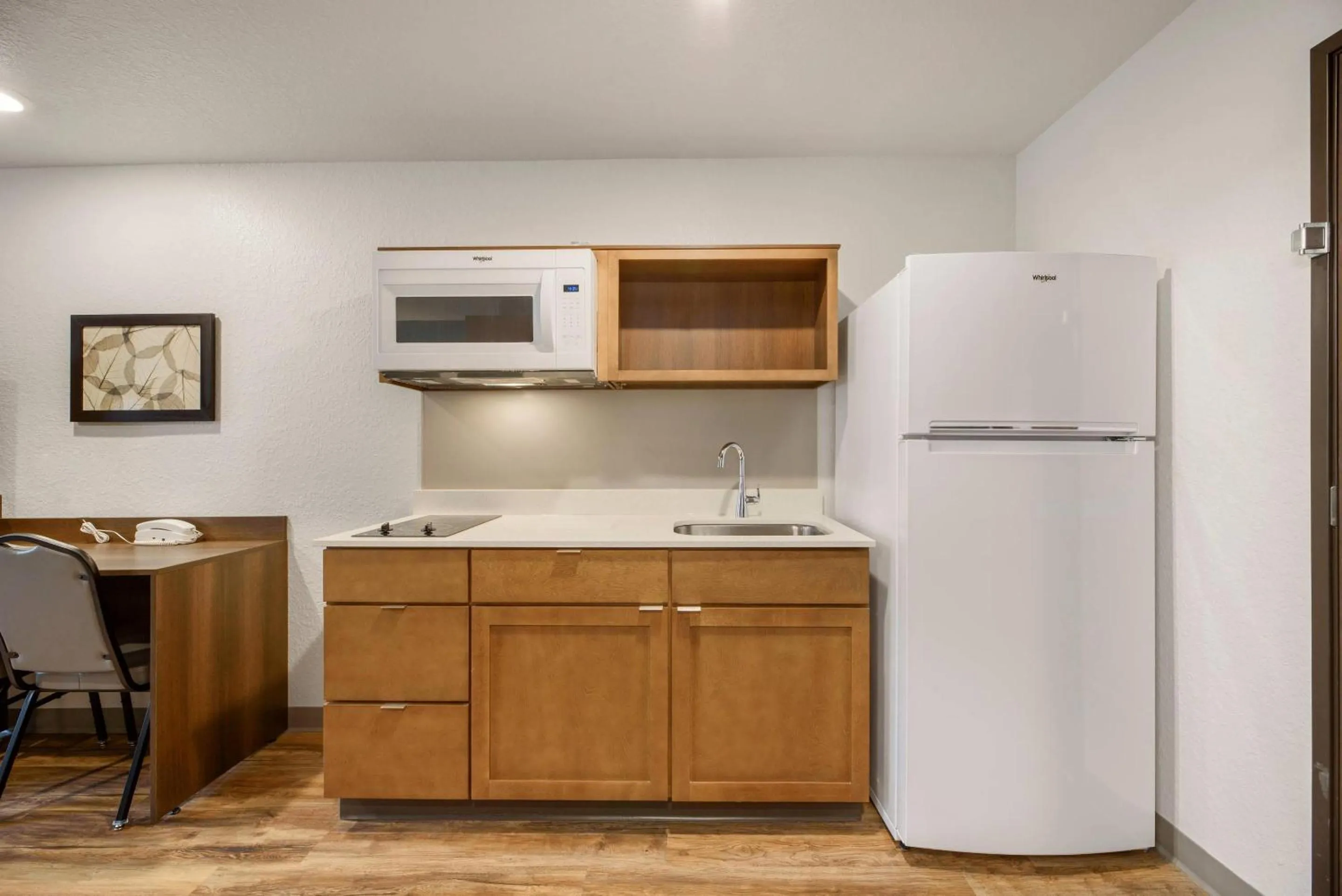 Bedroom in WoodSpring Suites Orlando I-4 & Convention Center