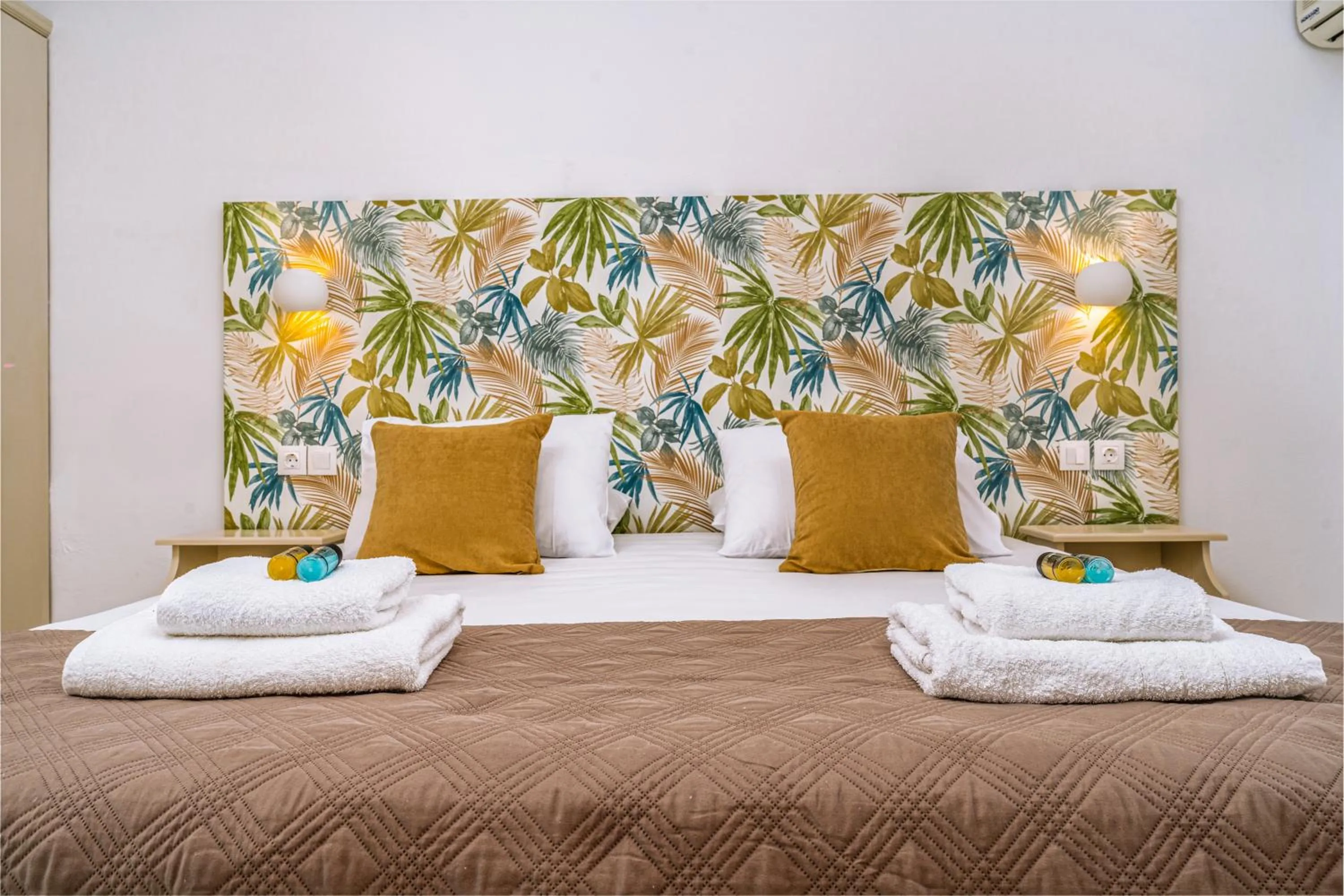 Bed in Pyrgaraki Studios and Apartments