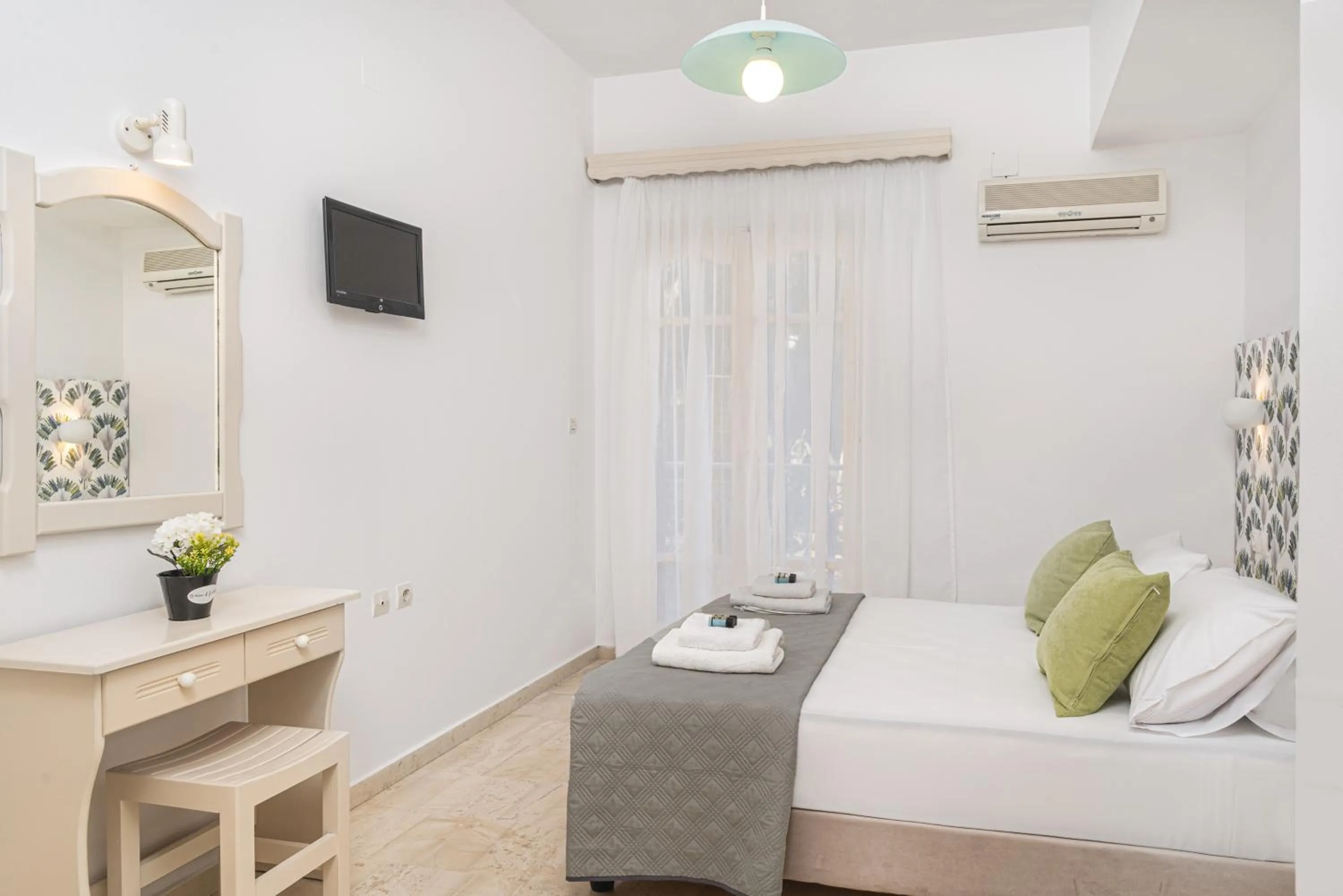 Bedroom, Bed in Pyrgaraki Studios and Apartments