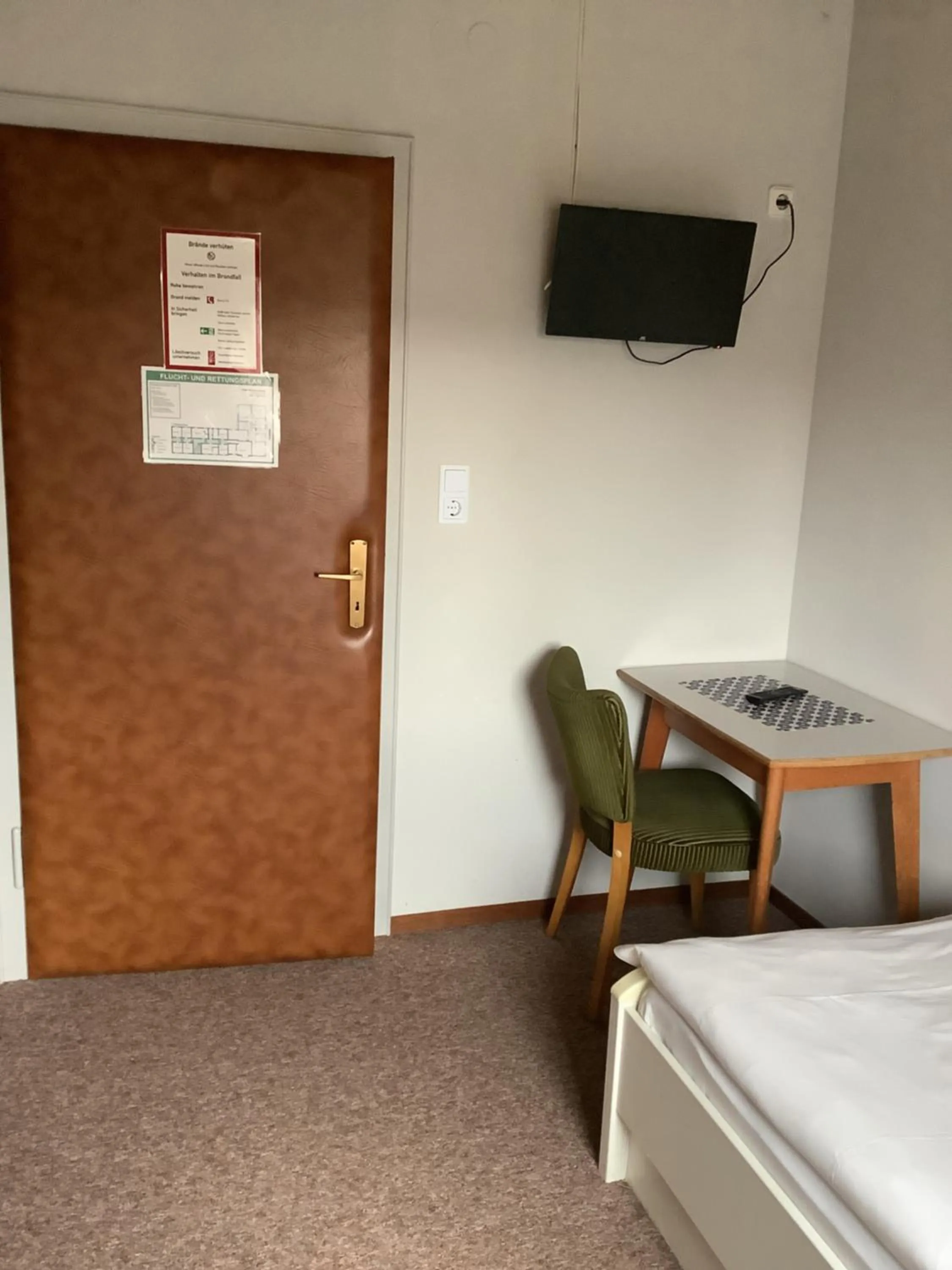 Seating area, Bed in Hotel Niedersachsen