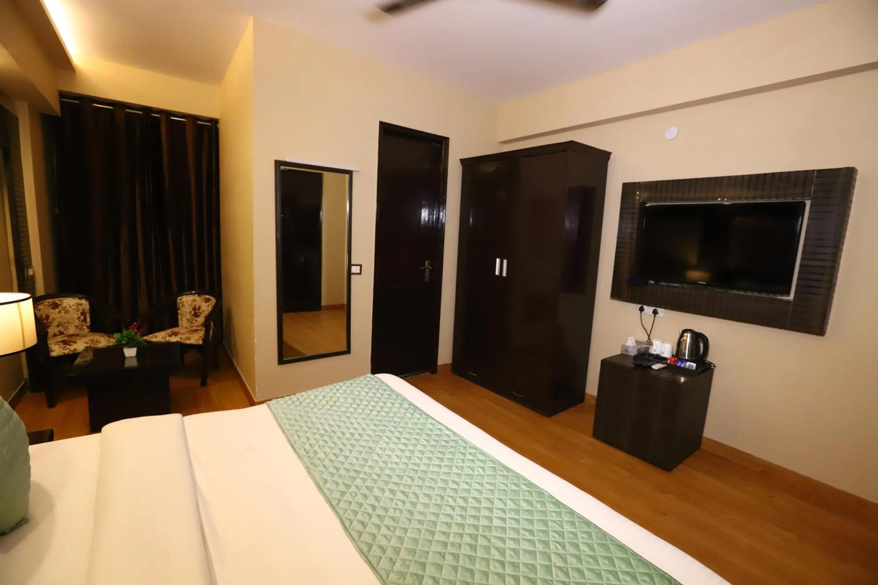 Photo of the whole room, Bed in Hotel Palm Grand Naraina New Delhi - Couple Friendly Local IDs Accepted