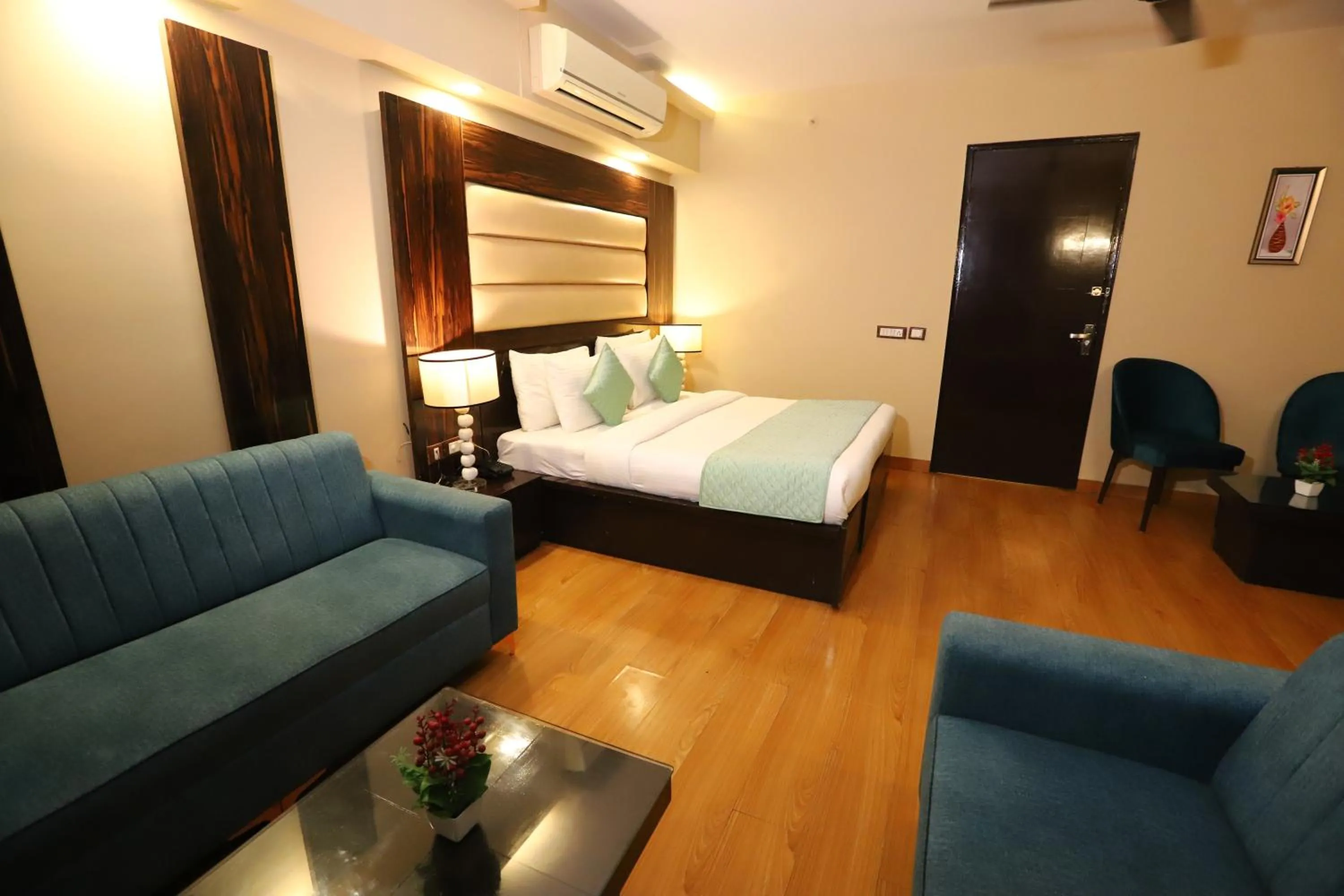 Photo of the whole room, Bed in Hotel Palm Grand Naraina New Delhi - Couple Friendly Local IDs Accepted