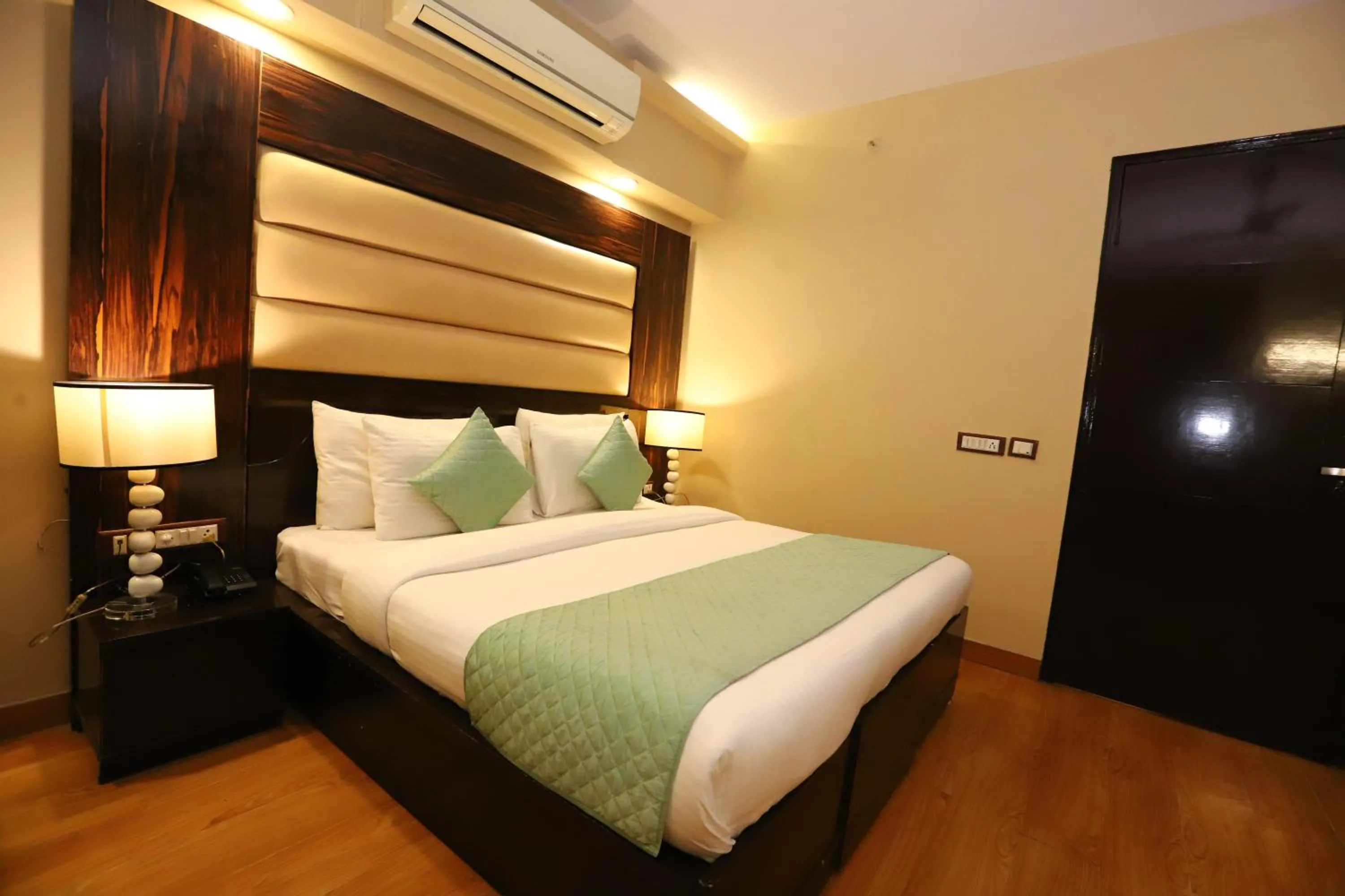 Photo of the whole room, Bed in Hotel Palm Grand Naraina New Delhi - Couple Friendly Local IDs Accepted