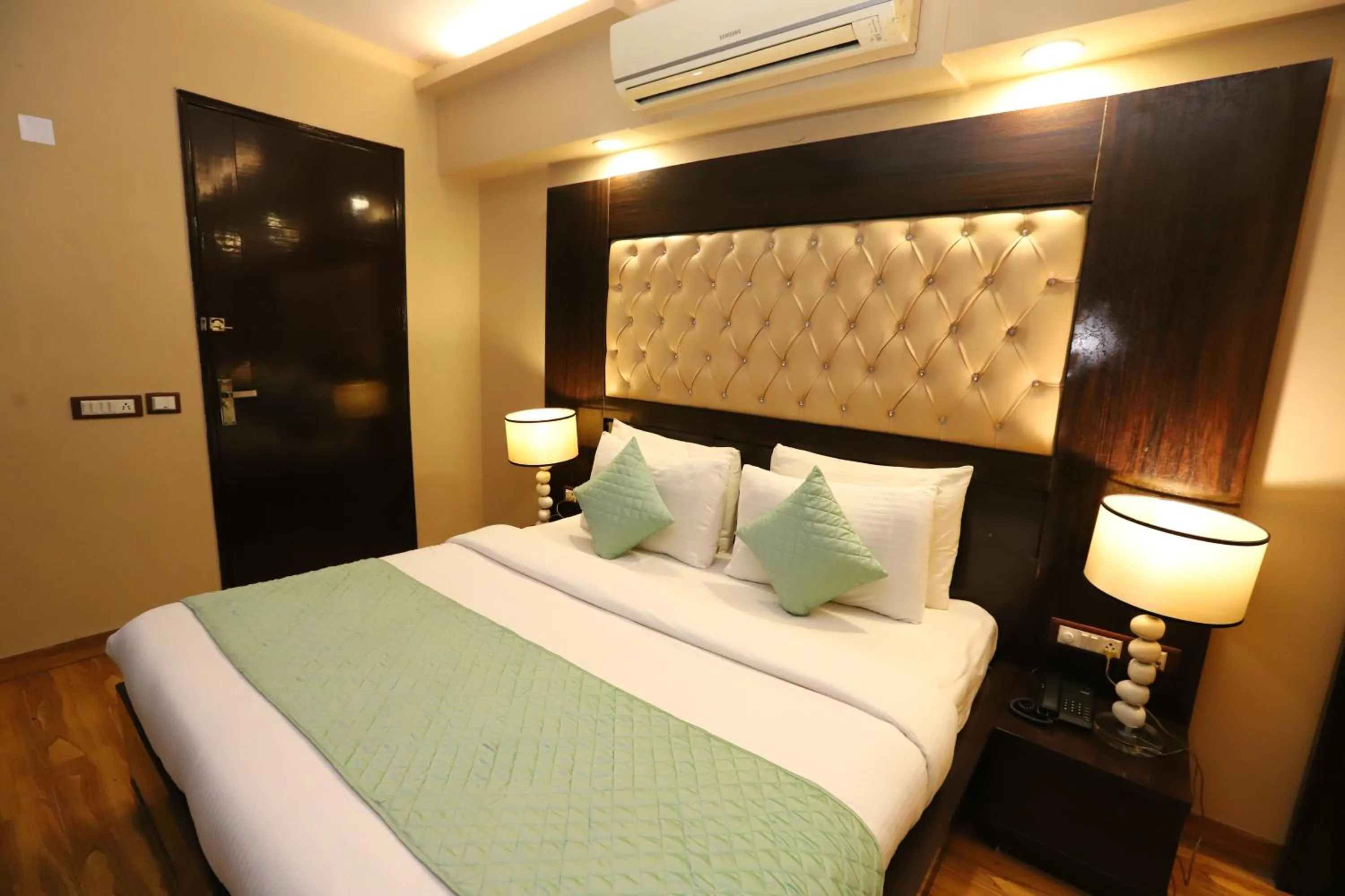 Photo of the whole room, Bed in Hotel Palm Grand Naraina New Delhi - Couple Friendly Local IDs Accepted