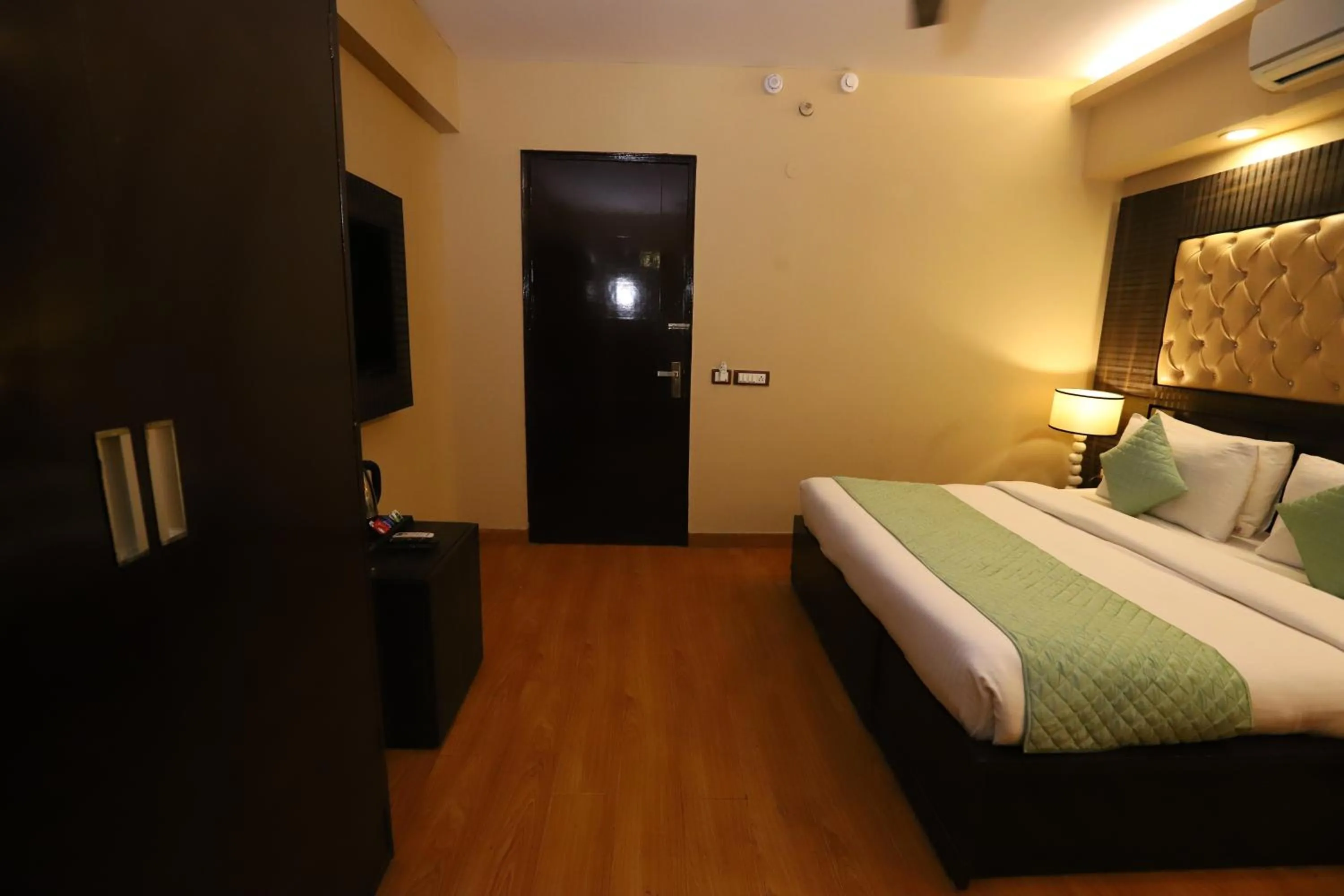 Photo of the whole room, Bed in Hotel Palm Grand Naraina New Delhi - Couple Friendly Local IDs Accepted