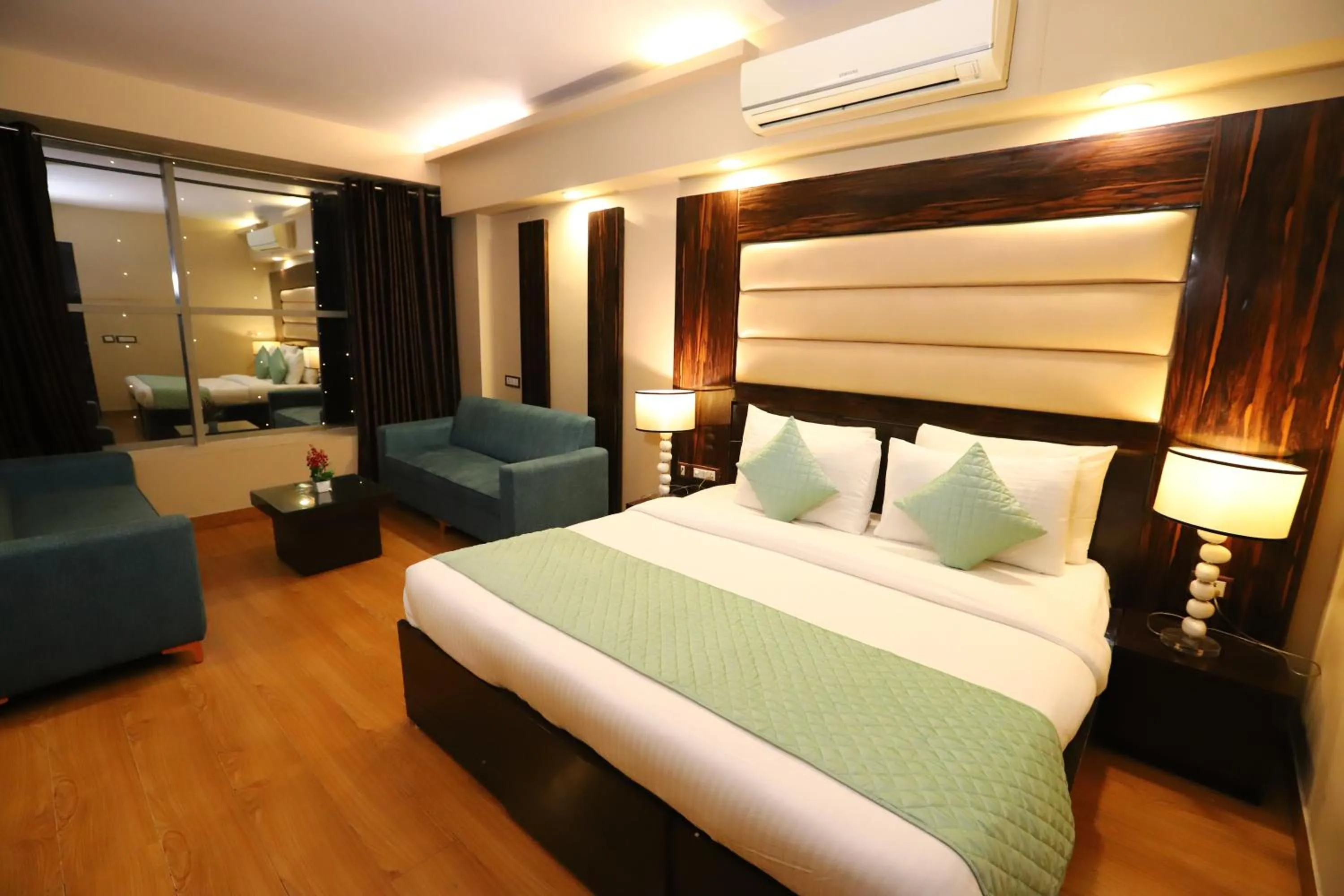 Photo of the whole room, Bed in Hotel Palm Grand Naraina New Delhi - Couple Friendly Local IDs Accepted