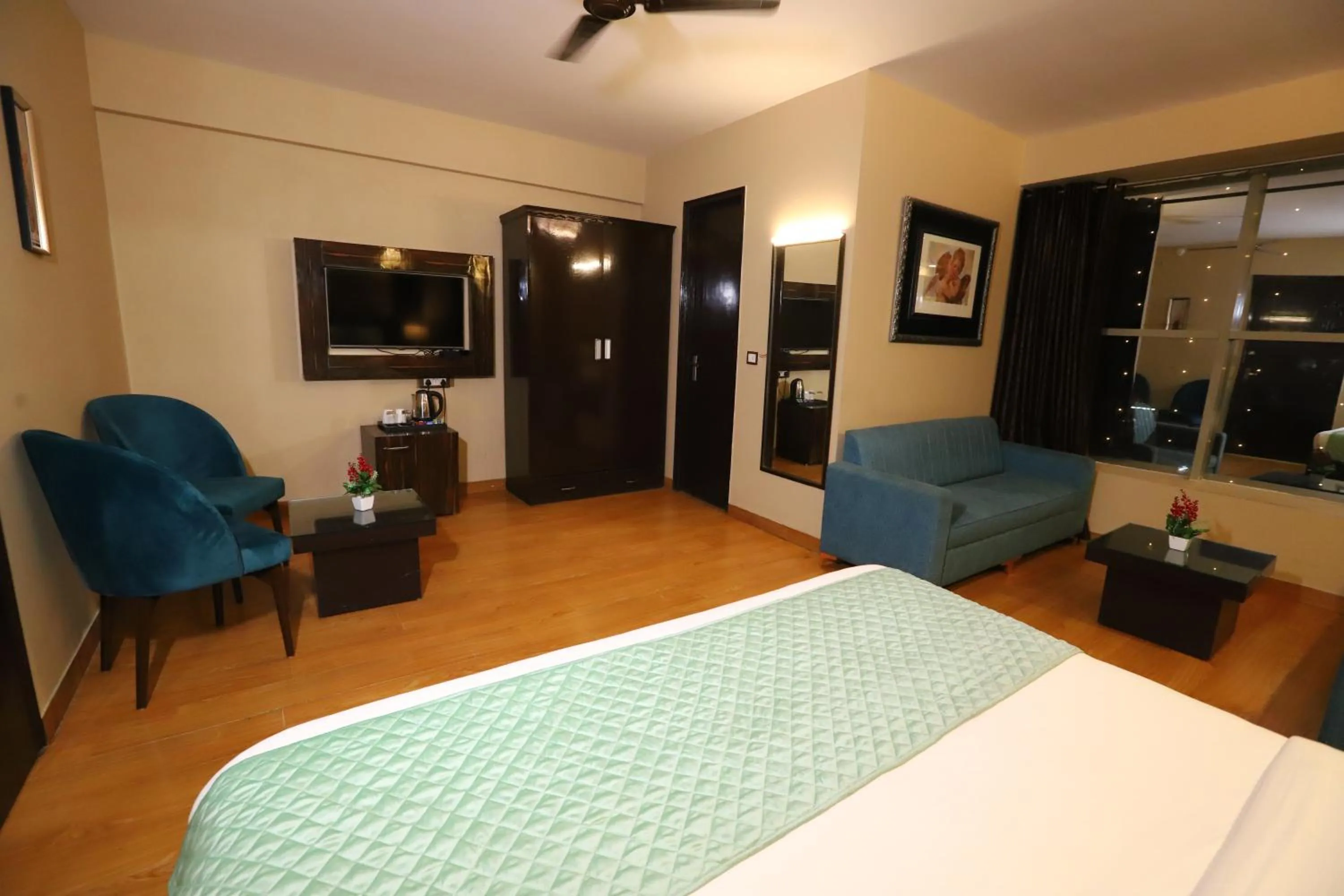 Photo of the whole room, Bed in Hotel Palm Grand Naraina New Delhi - Couple Friendly Local IDs Accepted