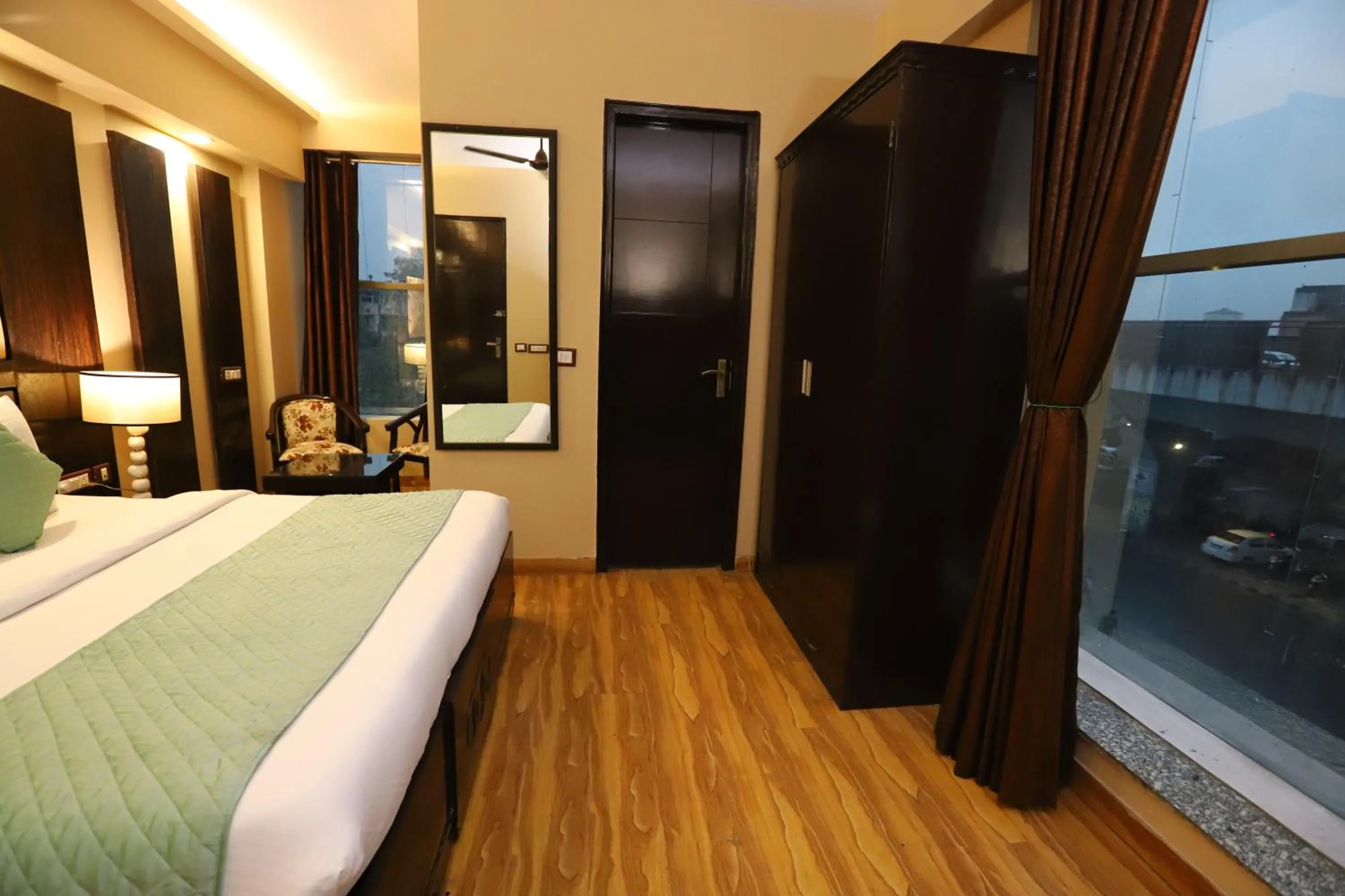 Photo of the whole room, Bed in Hotel Palm Grand Naraina New Delhi - Couple Friendly Local IDs Accepted