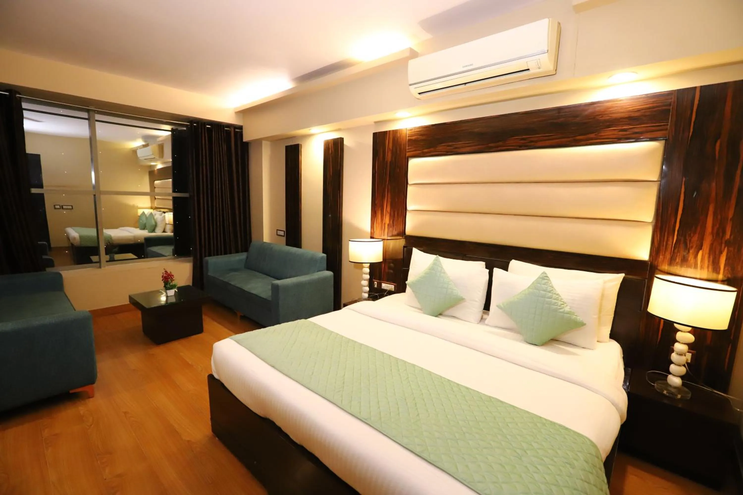 Photo of the whole room, Bed in Hotel Palm Grand Naraina New Delhi - Couple Friendly Local IDs Accepted