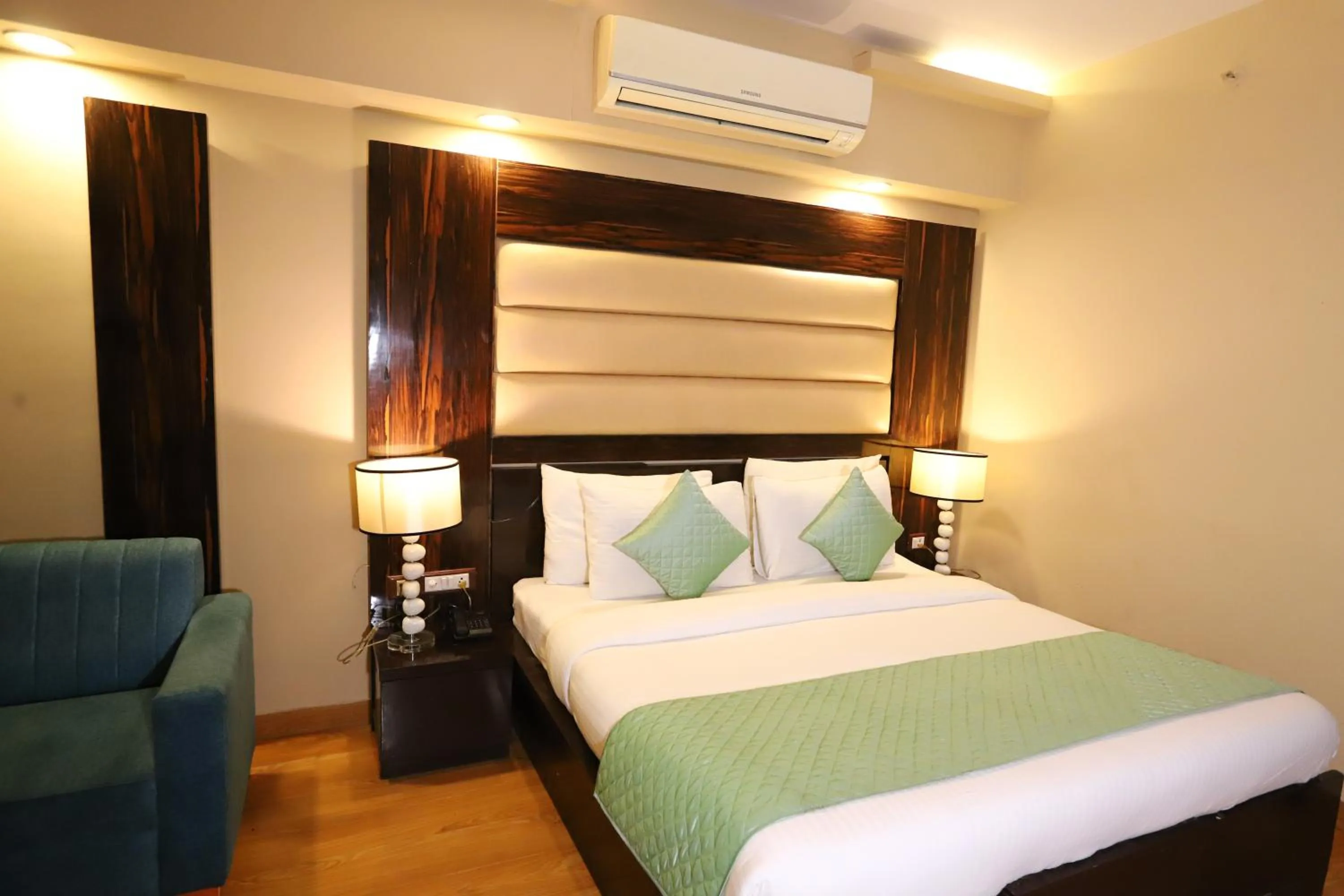 Photo of the whole room, Bed in Hotel Palm Grand Naraina New Delhi - Couple Friendly Local IDs Accepted