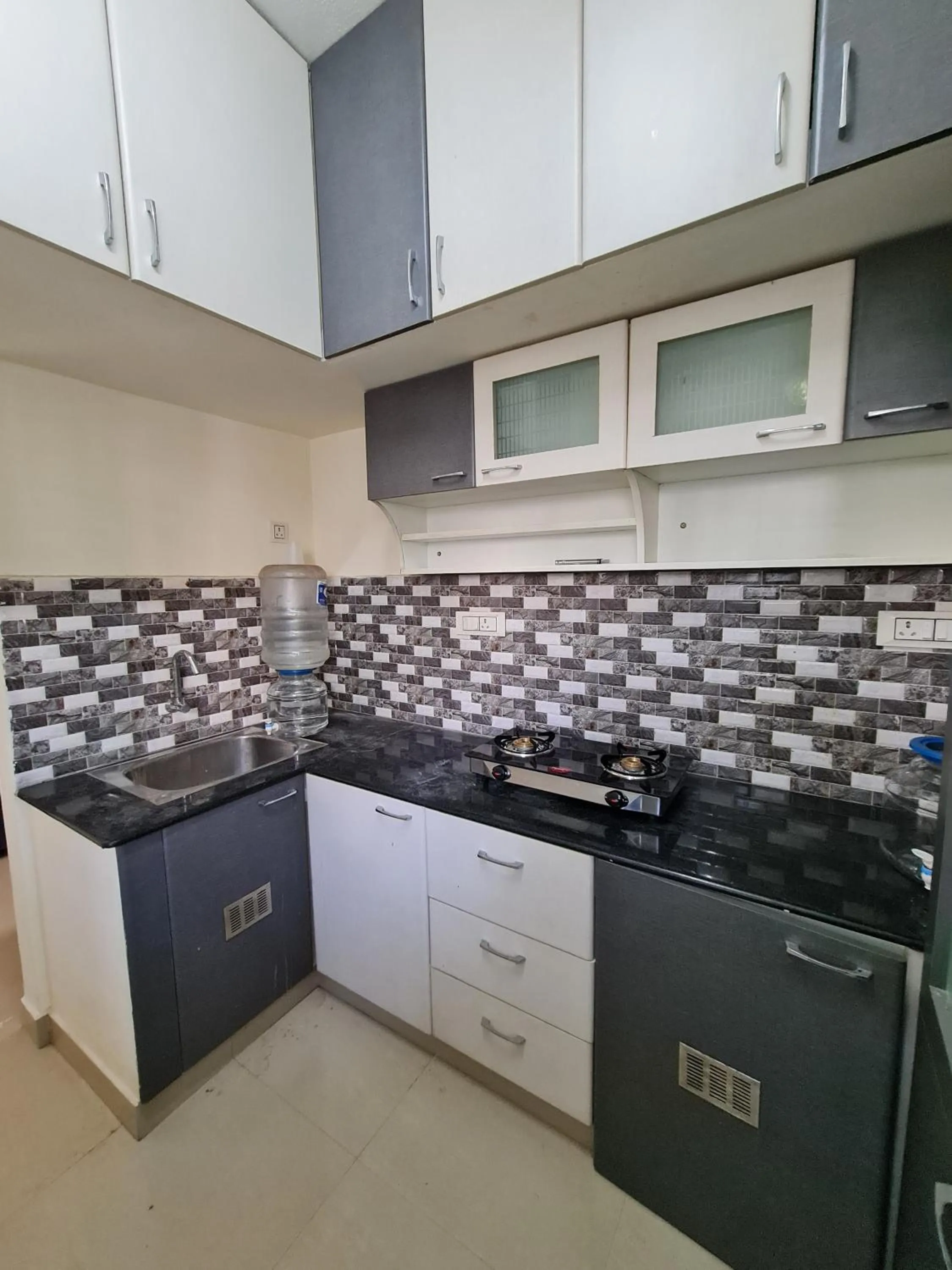 Kitchen or kitchenette in S4 Sruthi Service Apartments